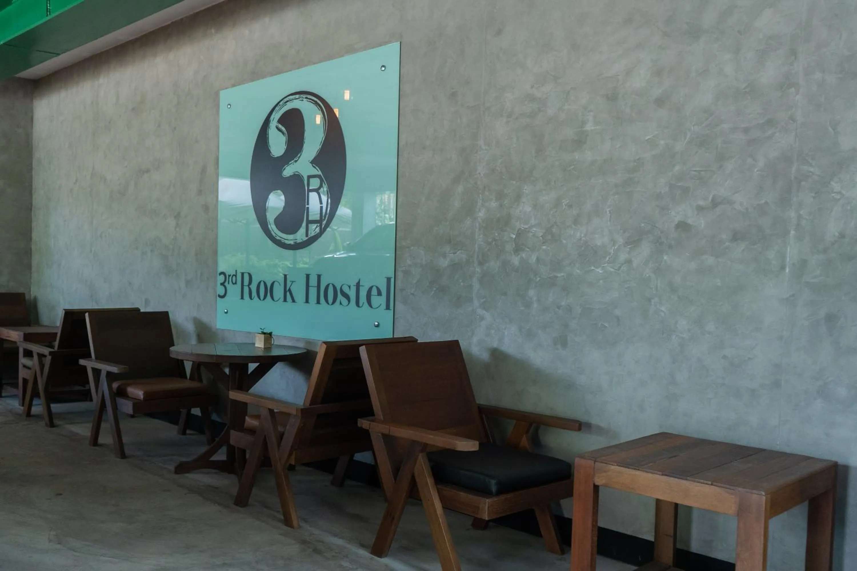 Communal lounge/ TV room in Third Rock Hostel