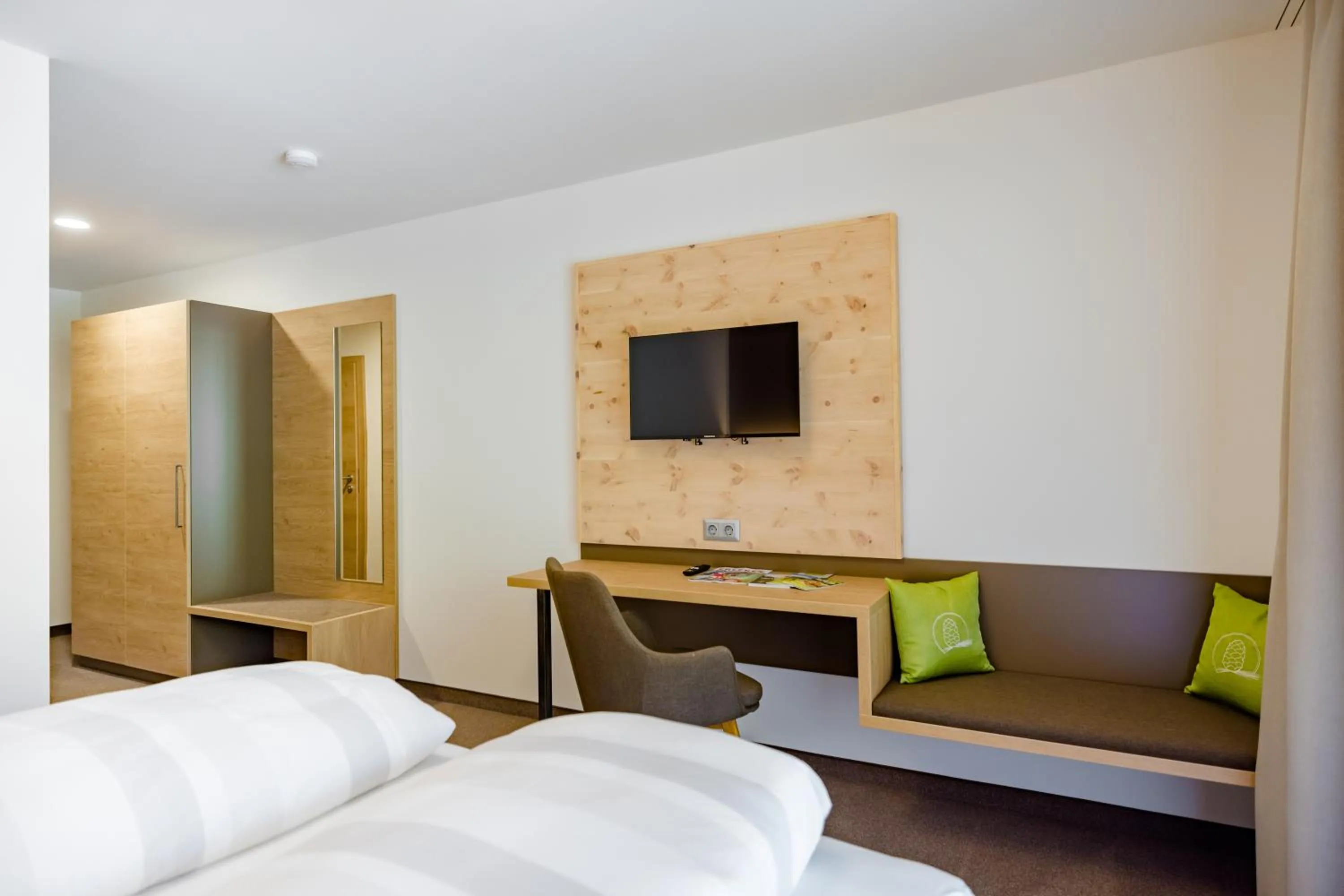 Seating area, Bed in Gästehaus Fiedlwirt