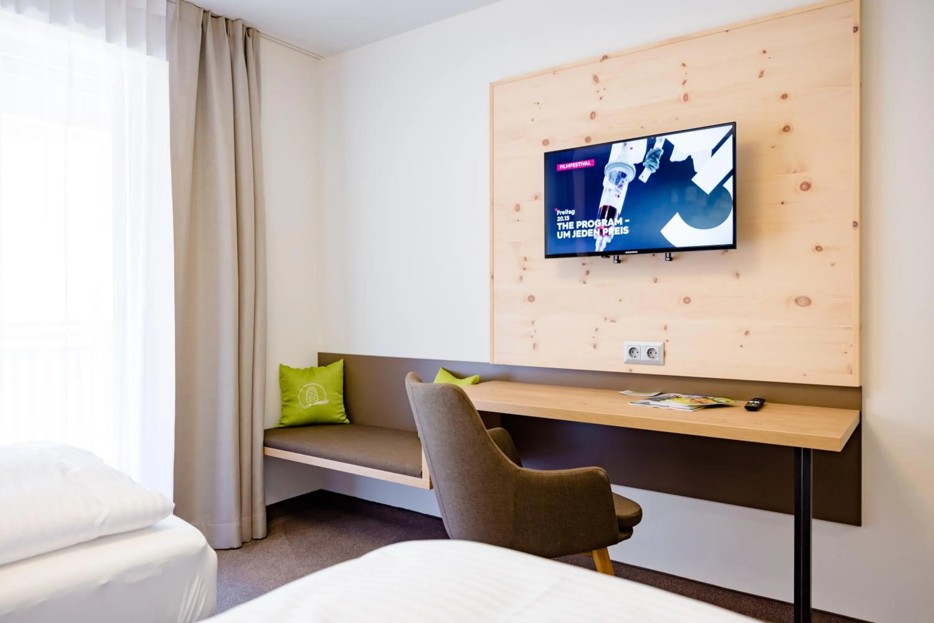 Seating area, Bed in Gästehaus Fiedlwirt