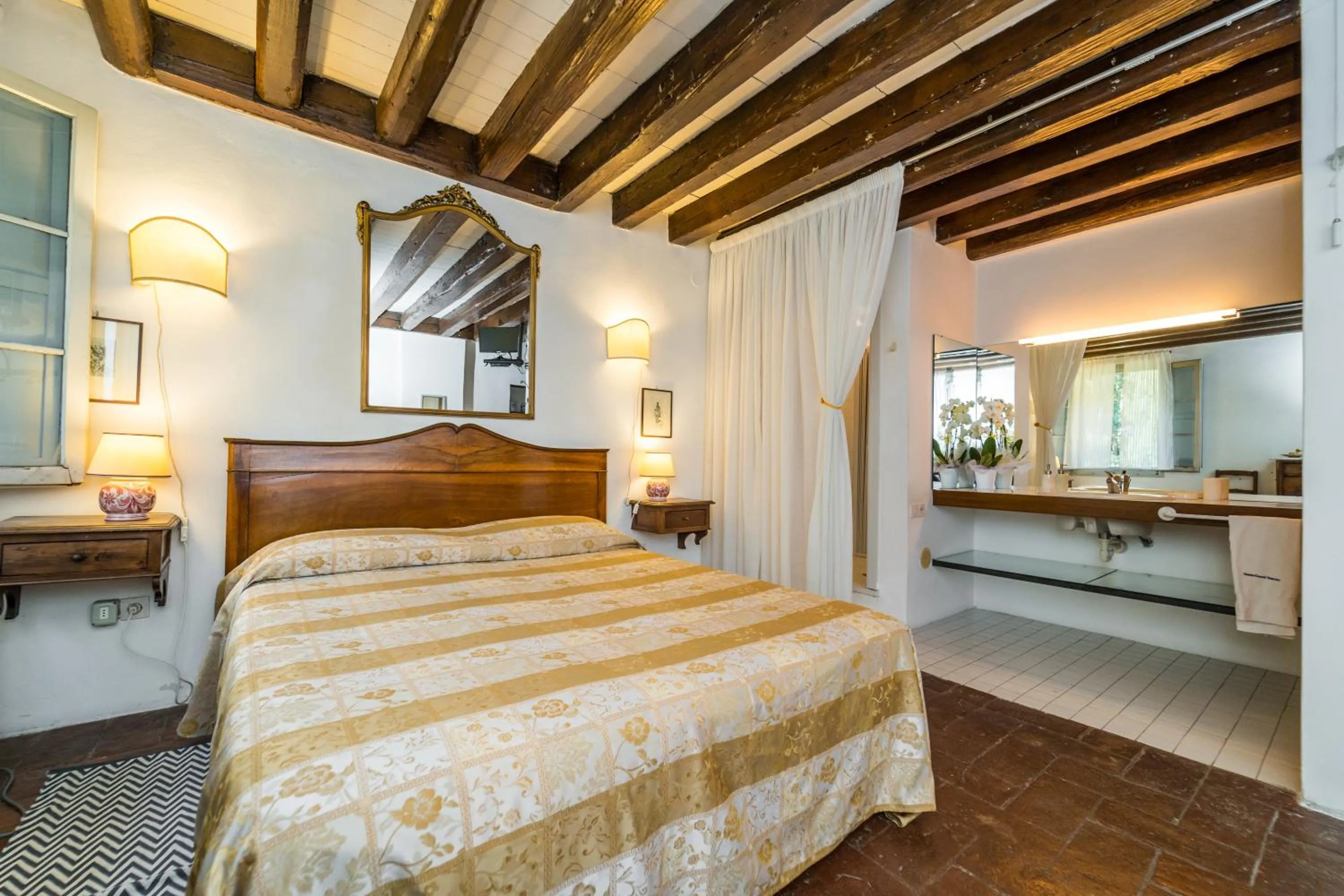 Bed in Agriturismo Tenuta Castel Venezze