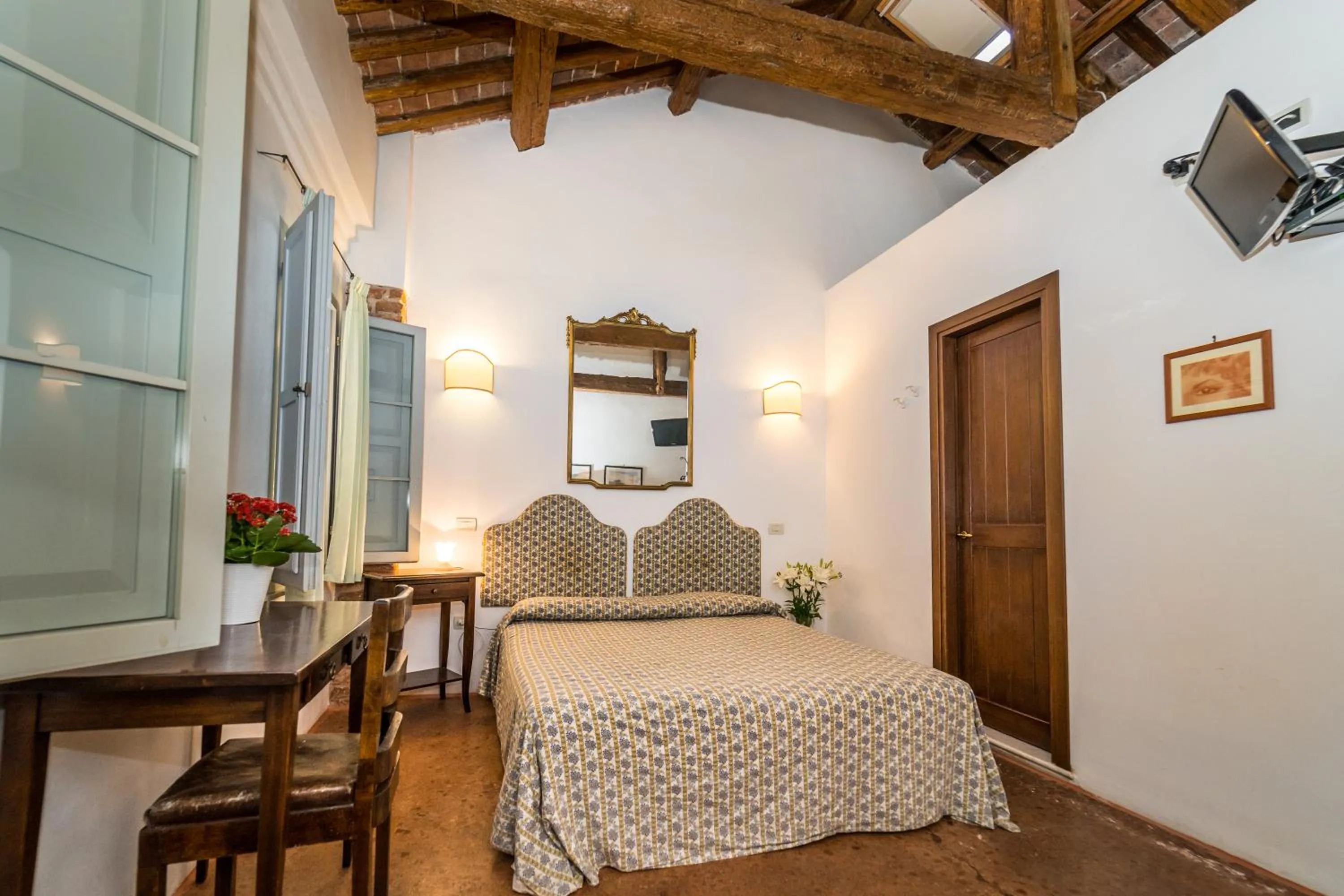 Photo of the whole room, Bed in Agriturismo Tenuta Castel Venezze