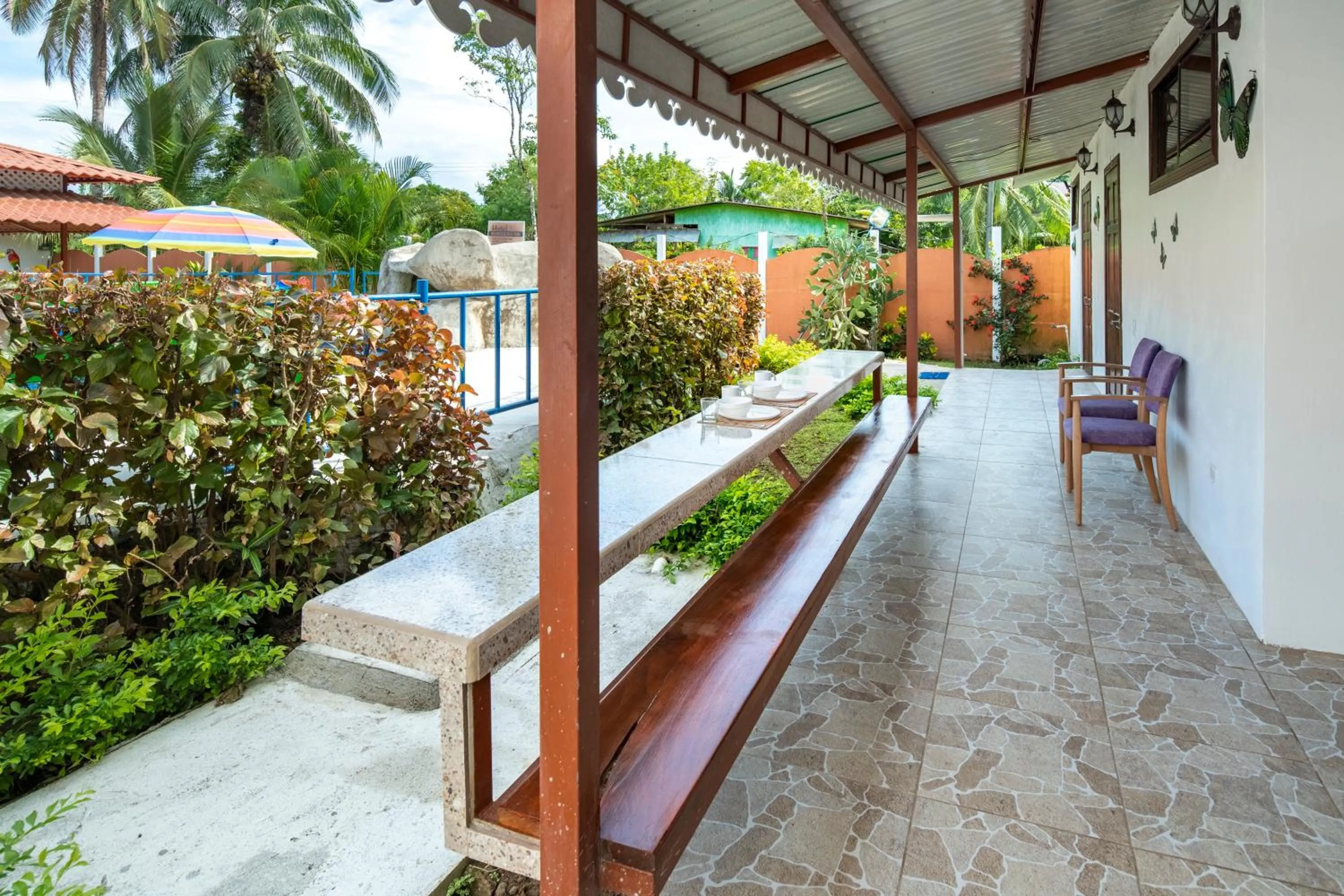 Seating area in Pangea Lodge with Shared Pool at the Heart of Manzanillo