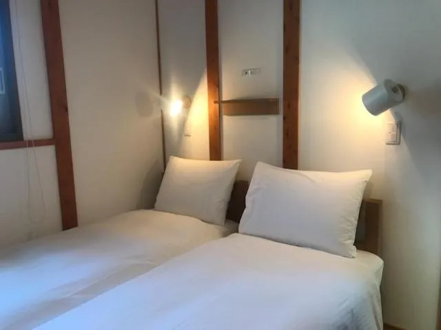 Photo of the whole room, Bed in Quaint House Naoshima