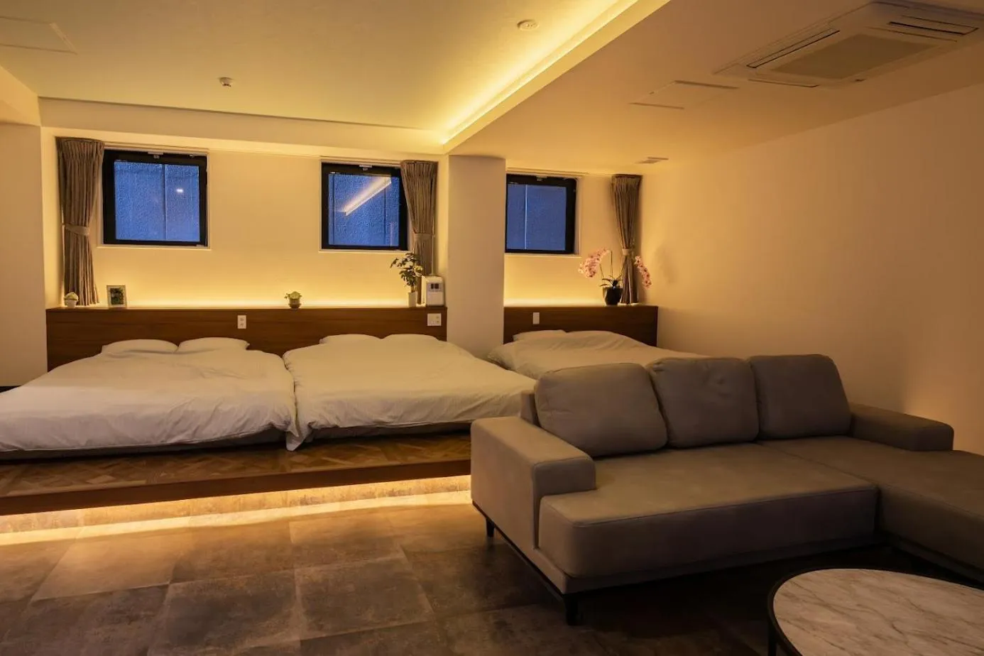 Bed in Hotel Xcell Hiroshima Nagarekawa