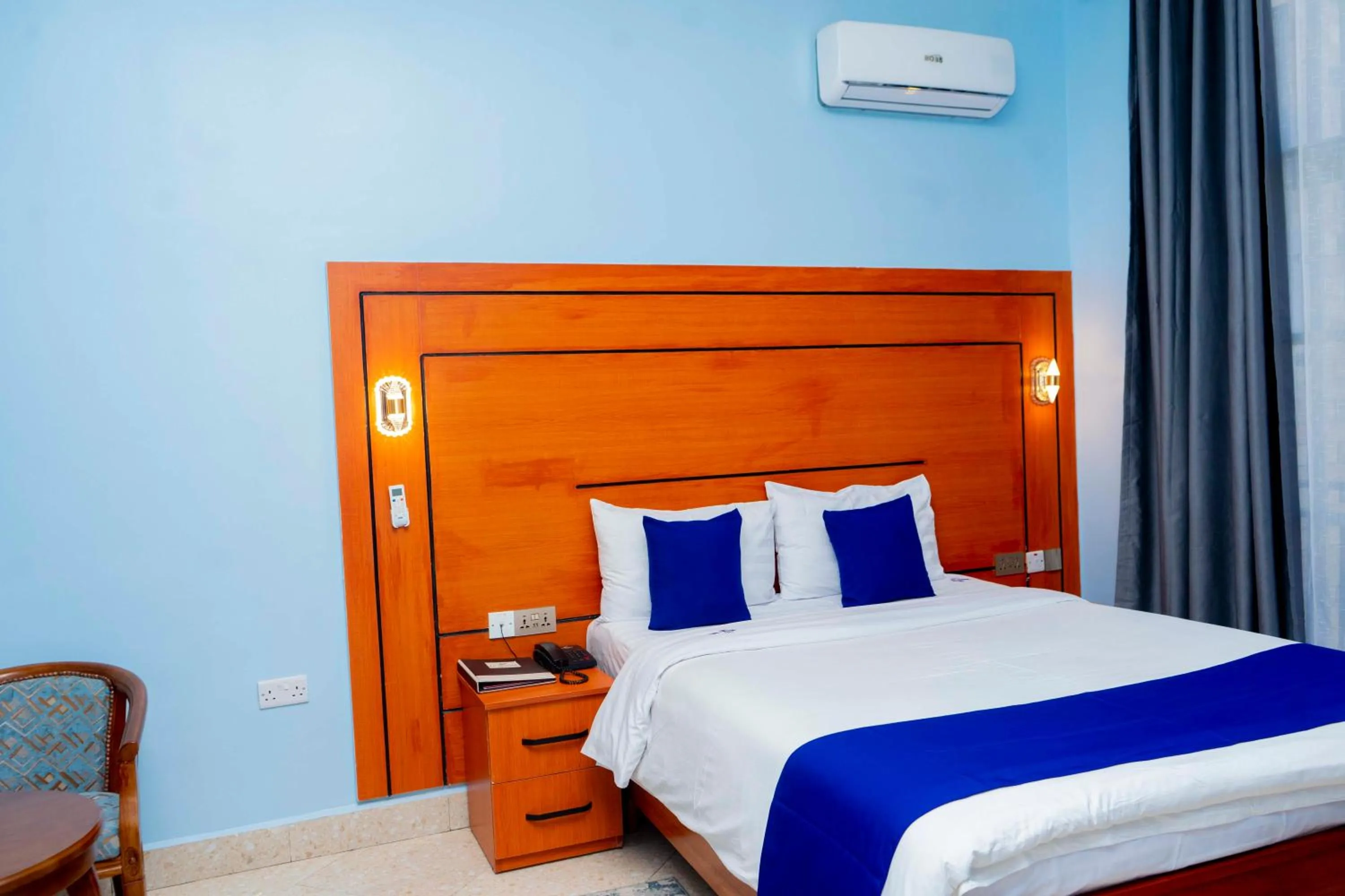 Bed in La Stanar Hotel