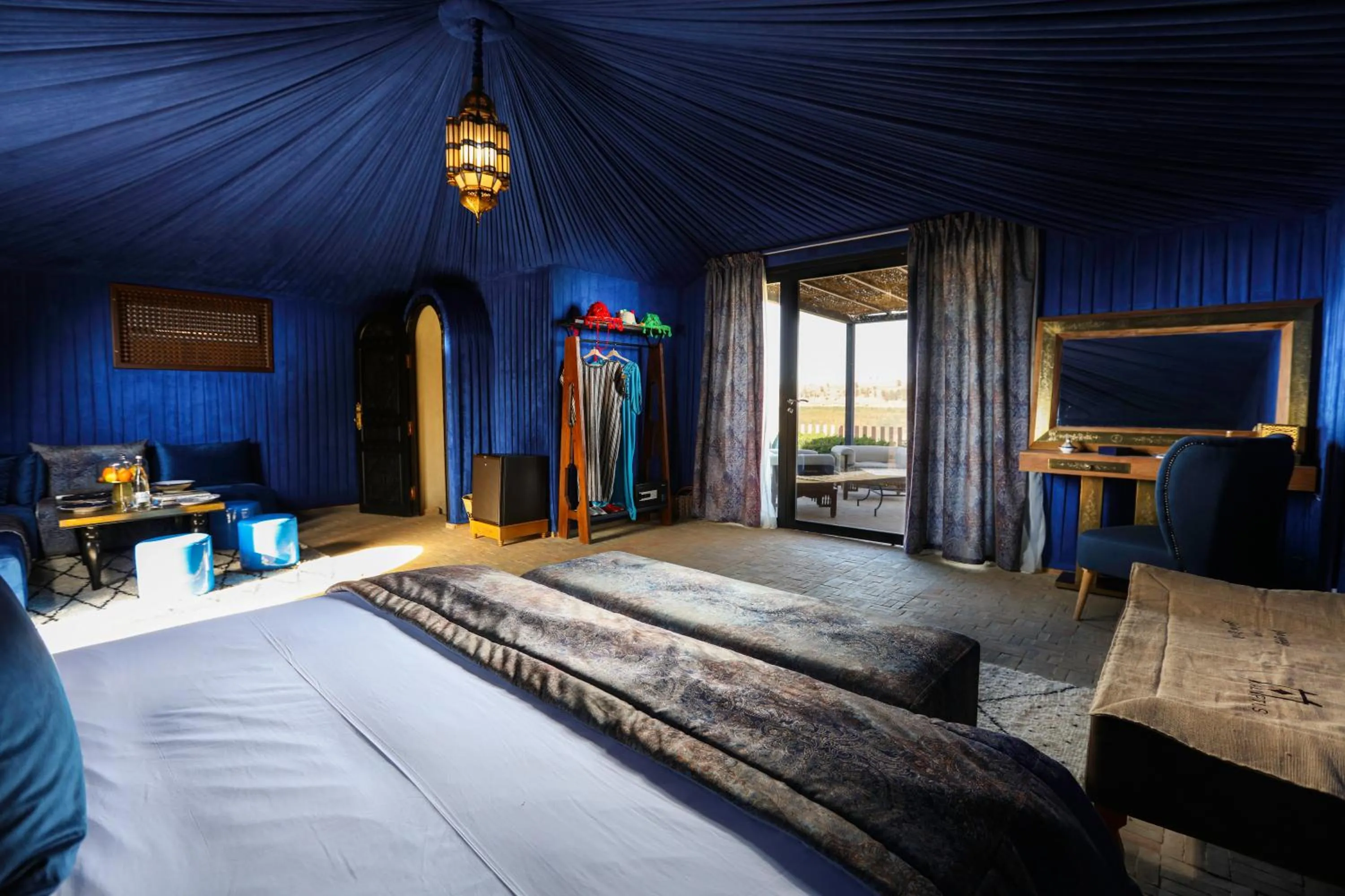 Bed in Kalyptus Luxury Camp