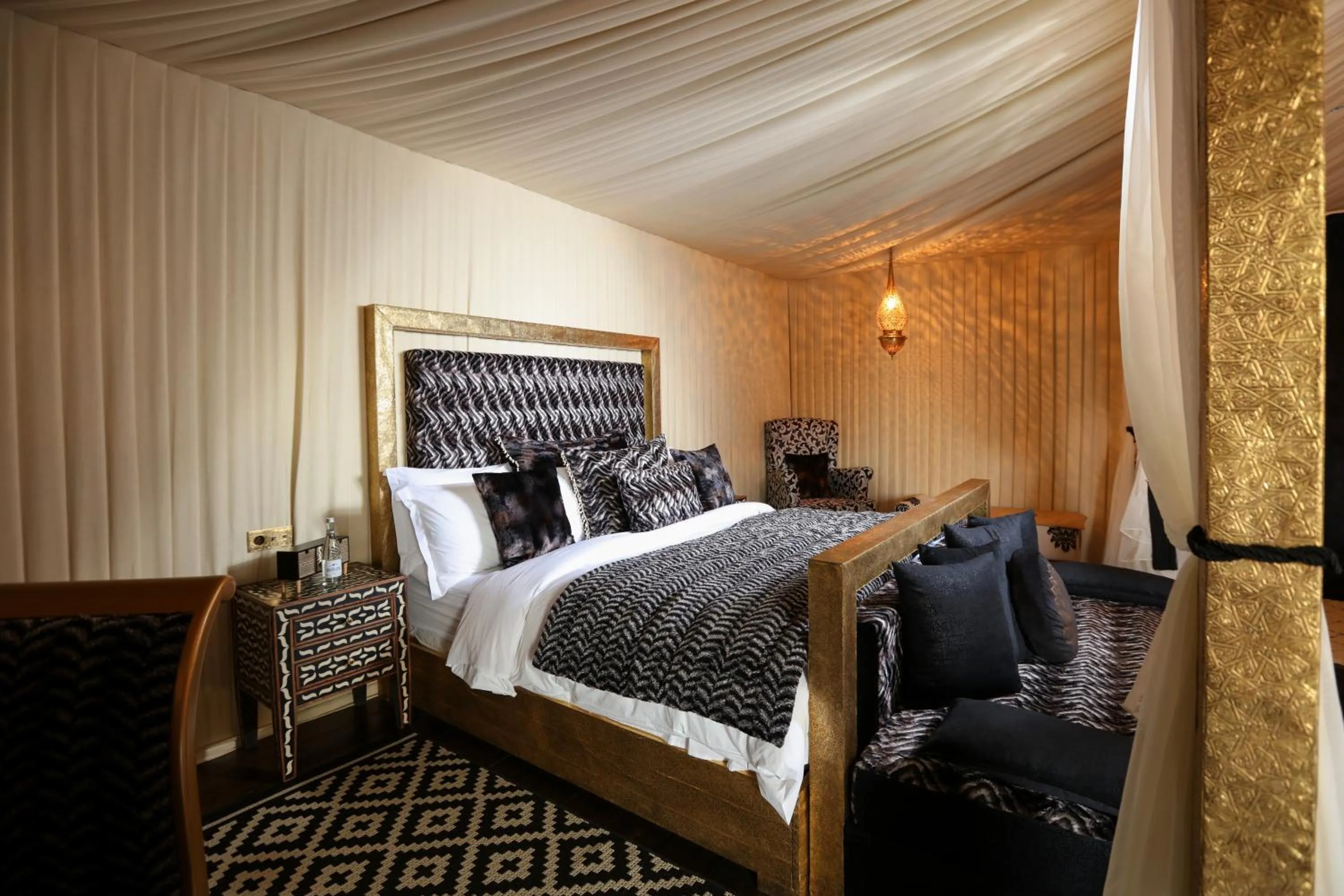 Bed in Kalyptus Luxury Camp