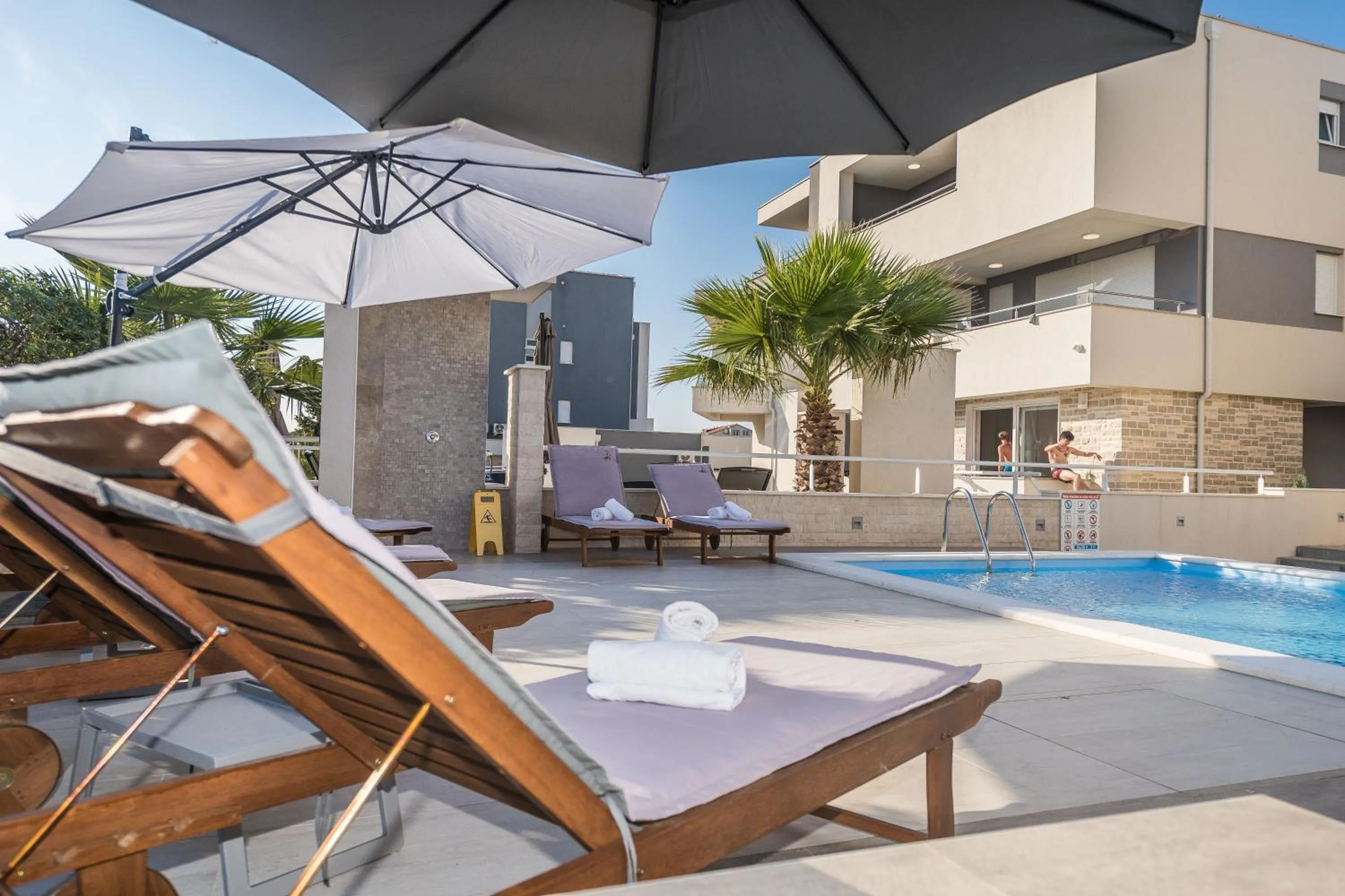 Swimming pool in Apartments & Rooms Danivan Pool Villas B