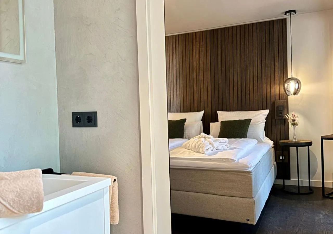 Photo of the whole room, Bed in Hotel-Hofbräu am Stadtring