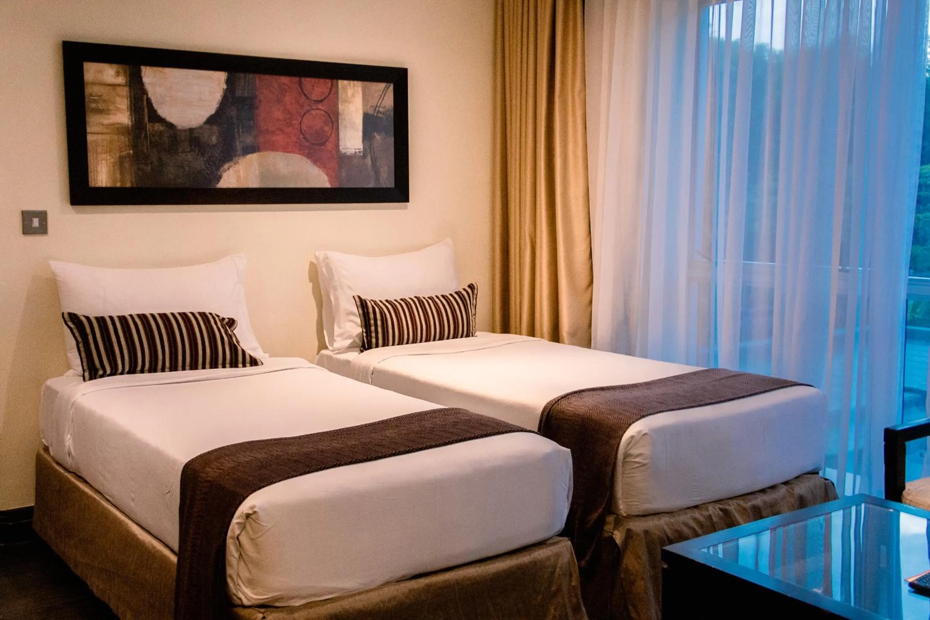 Bed in Mount Meru Hotel