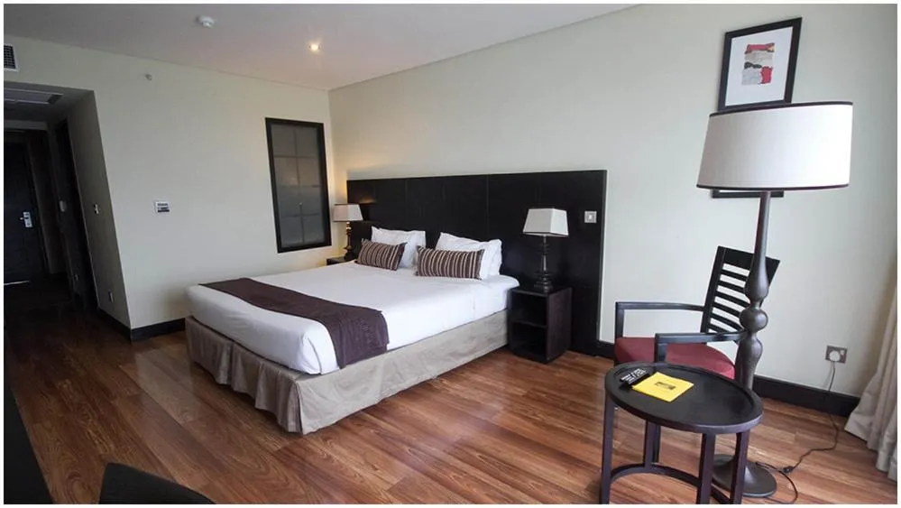 Bed in Mount Meru Hotel