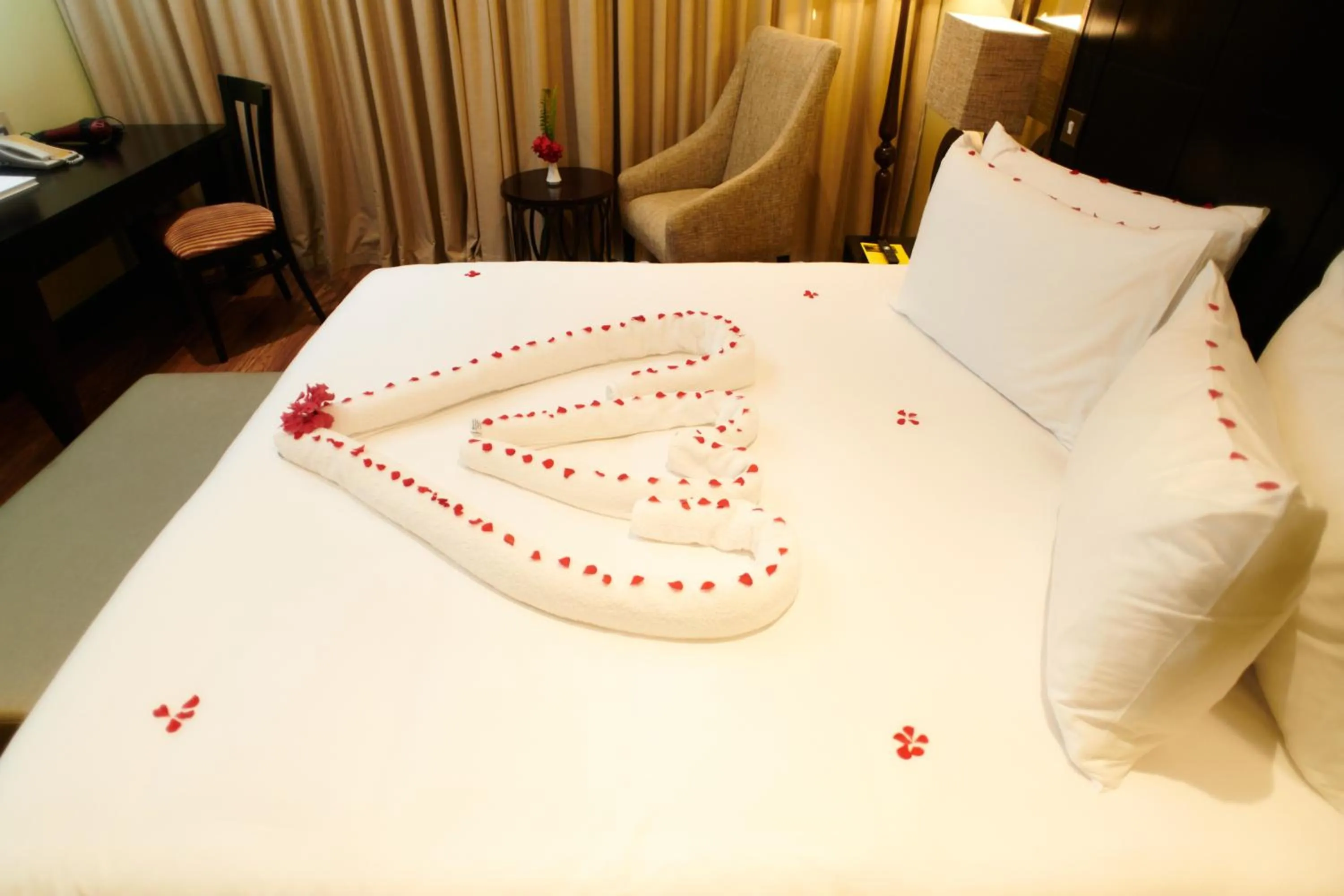 Bed in Mount Meru Hotel