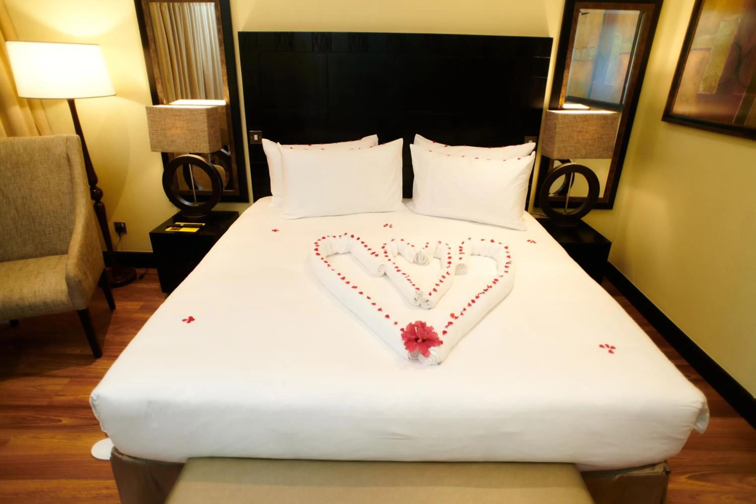 Bed in Mount Meru Hotel