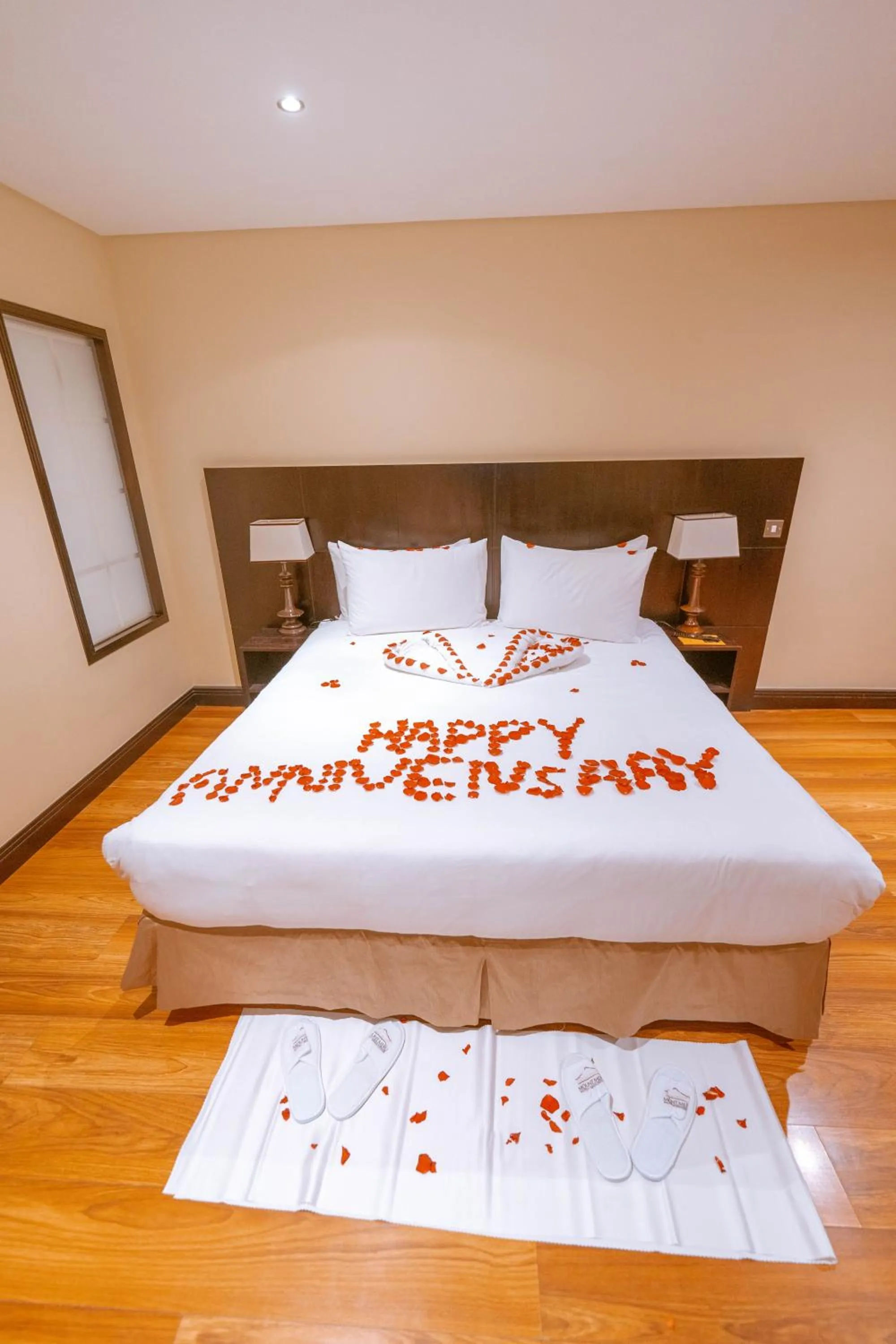 Bed in Mount Meru Hotel