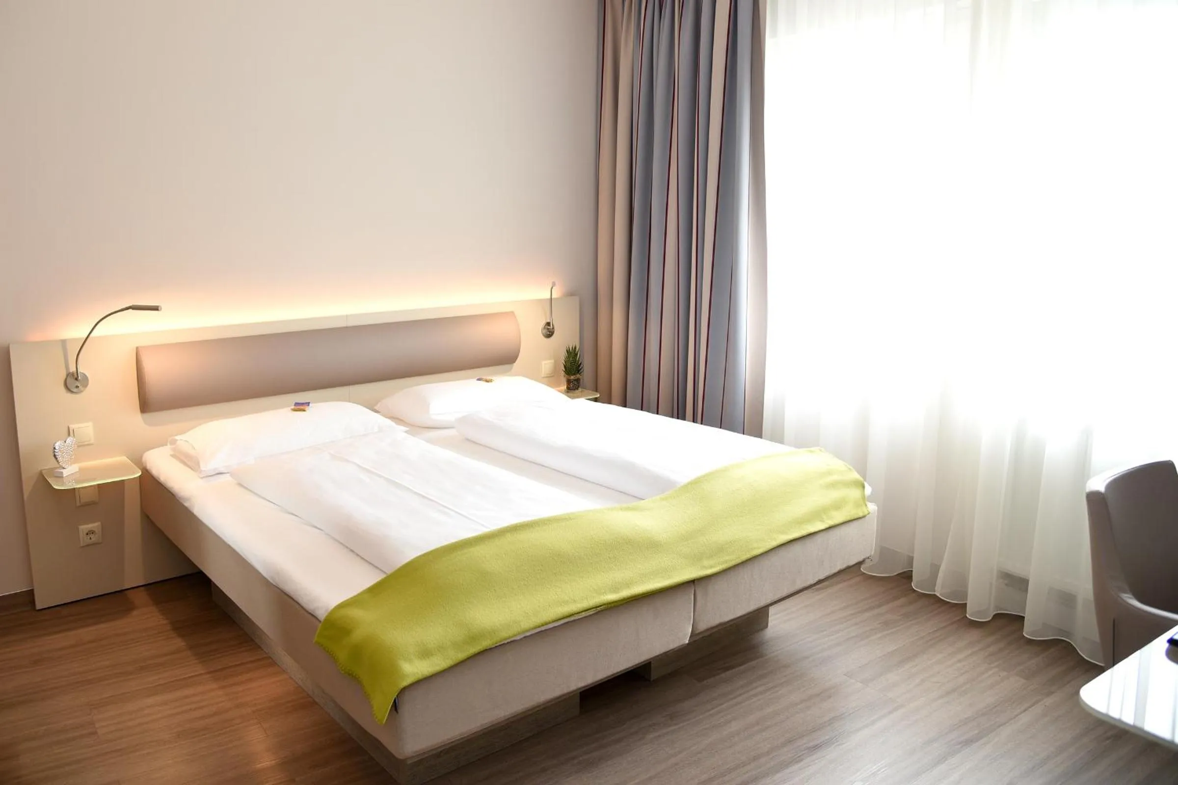 Photo of the whole room, Bed in Hotel Bonn City