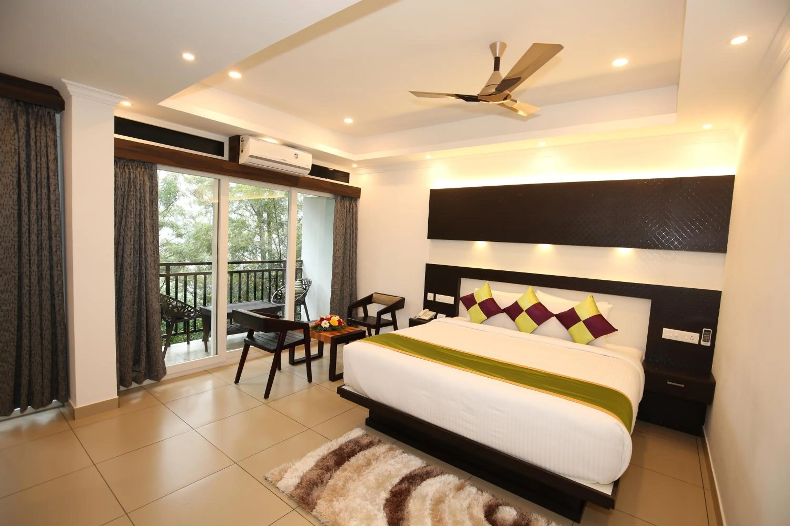 Photo of the whole room, Bed in AMUSE VISTA RESORTS AND SPA