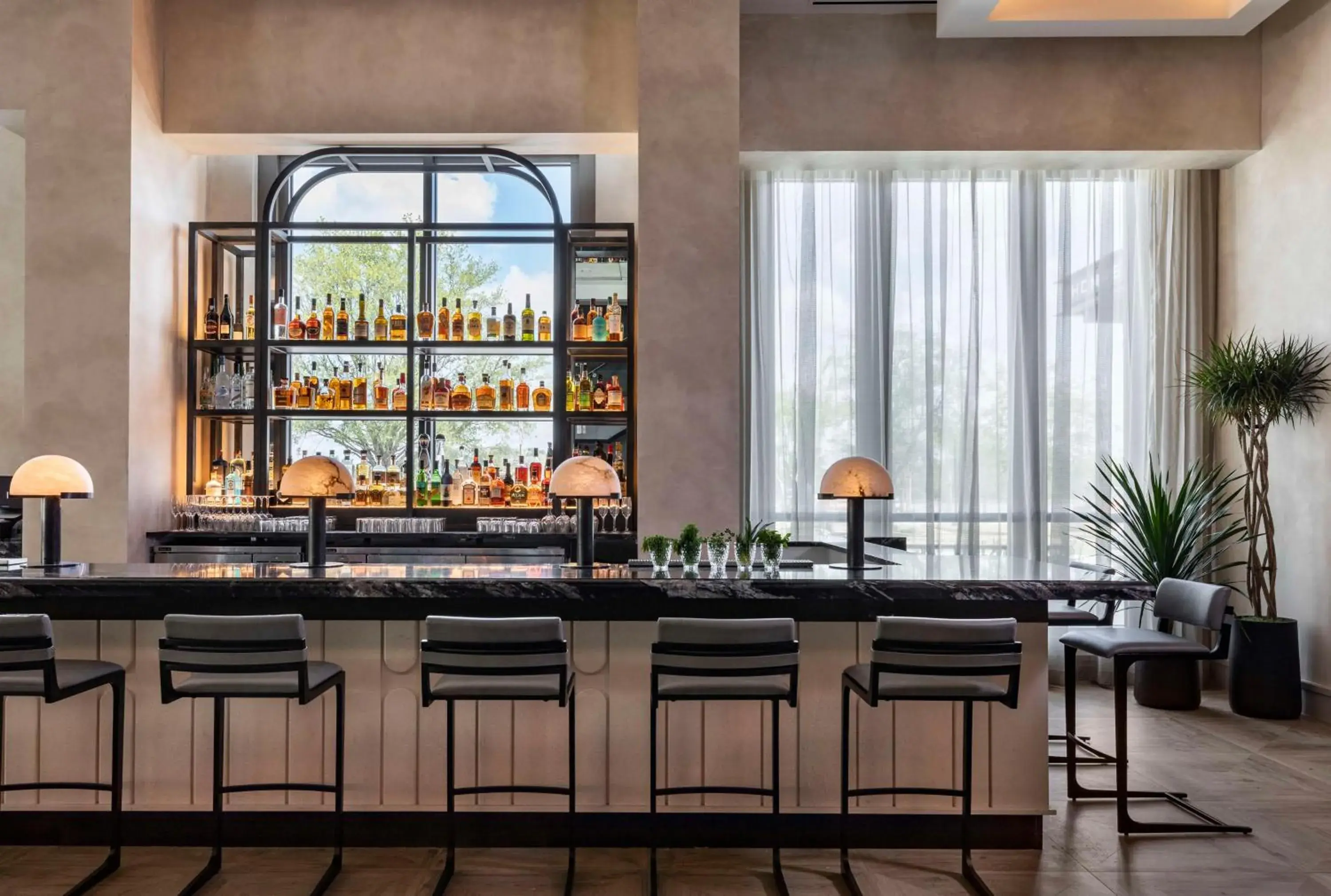 Lounge or bar in Thompson Savannah, by Hyatt Lounge or bar in Thompson Savannah, by Hyatt