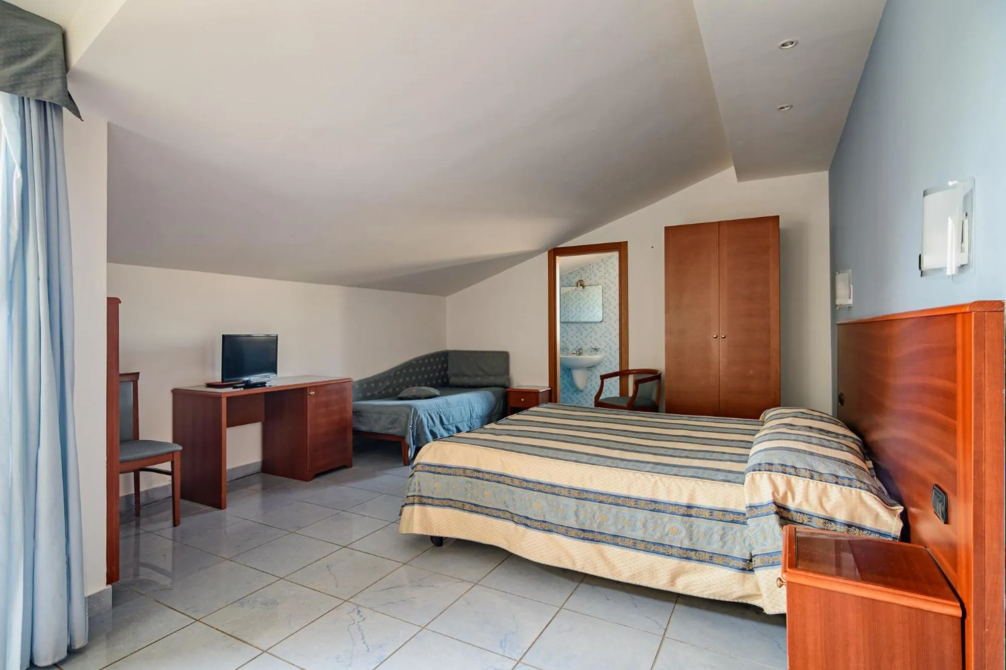 Bed in Hotel Serenella