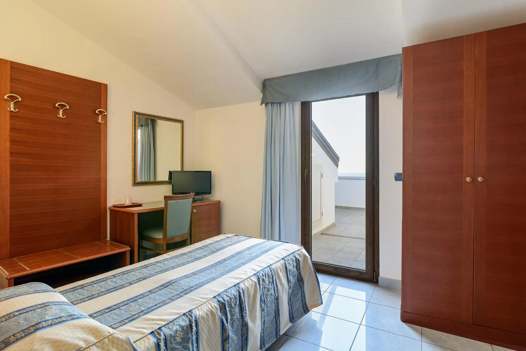 Bed in Hotel Serenella