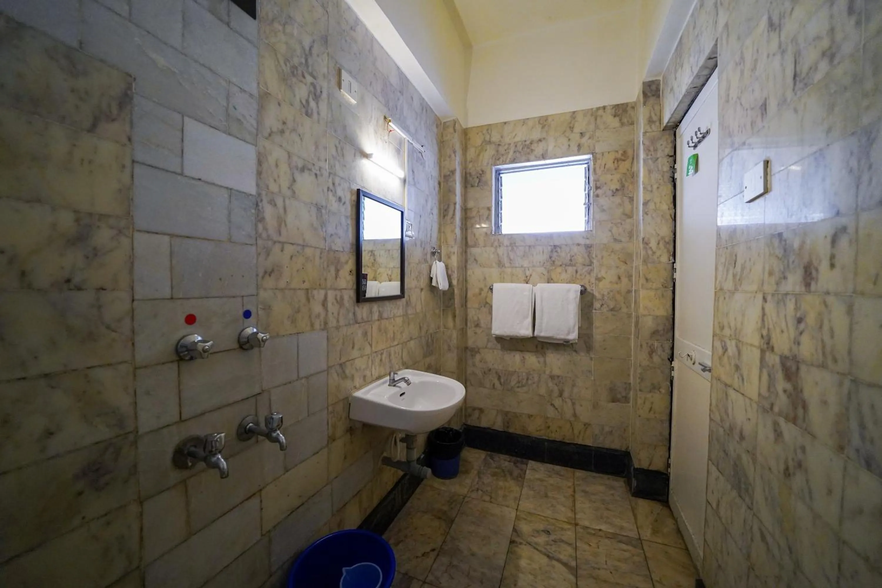 Bathroom in Olive Zip Calangute Mira by Embassy Group