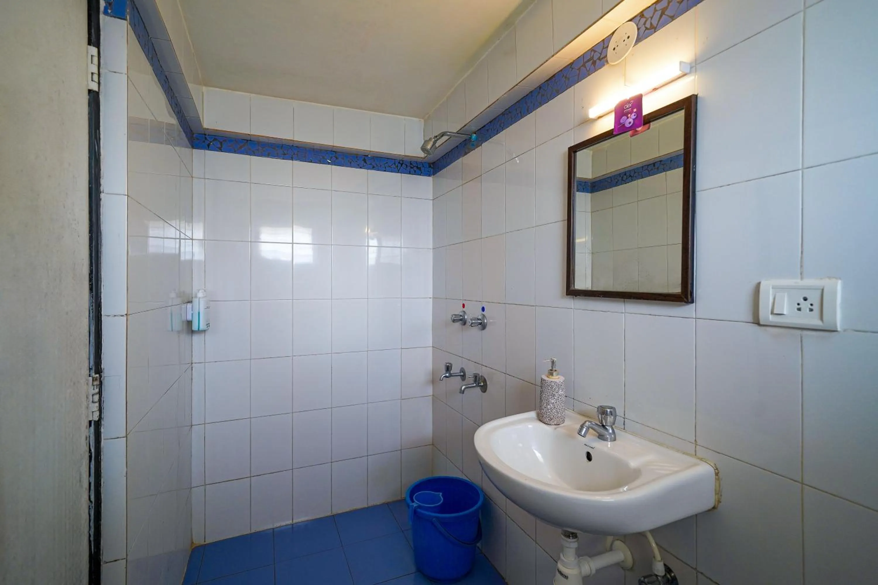 Bathroom in Olive Zip Calangute Mira by Embassy Group