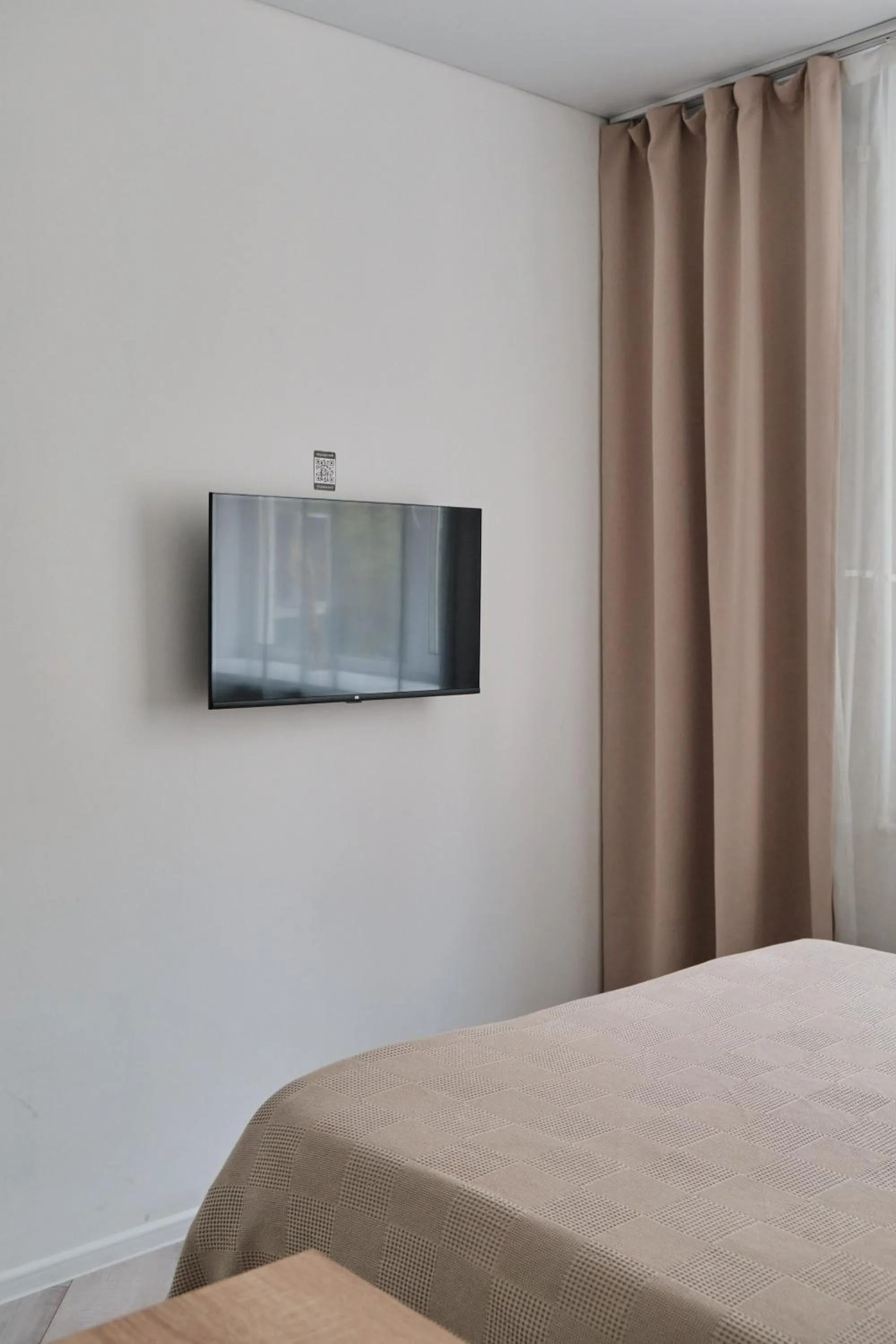 Bed in Seven City Apartments