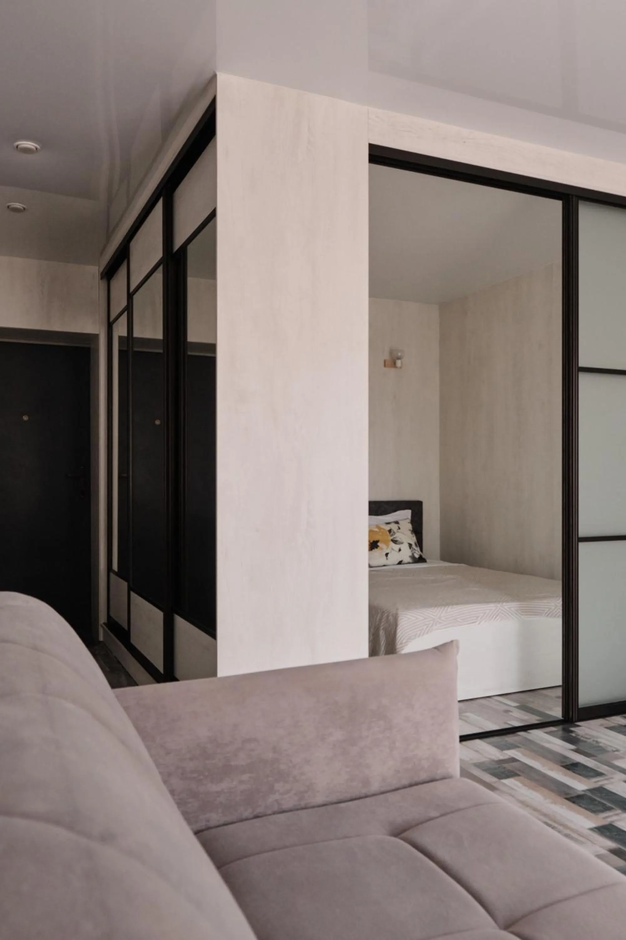 Bed in Seven City Apartments