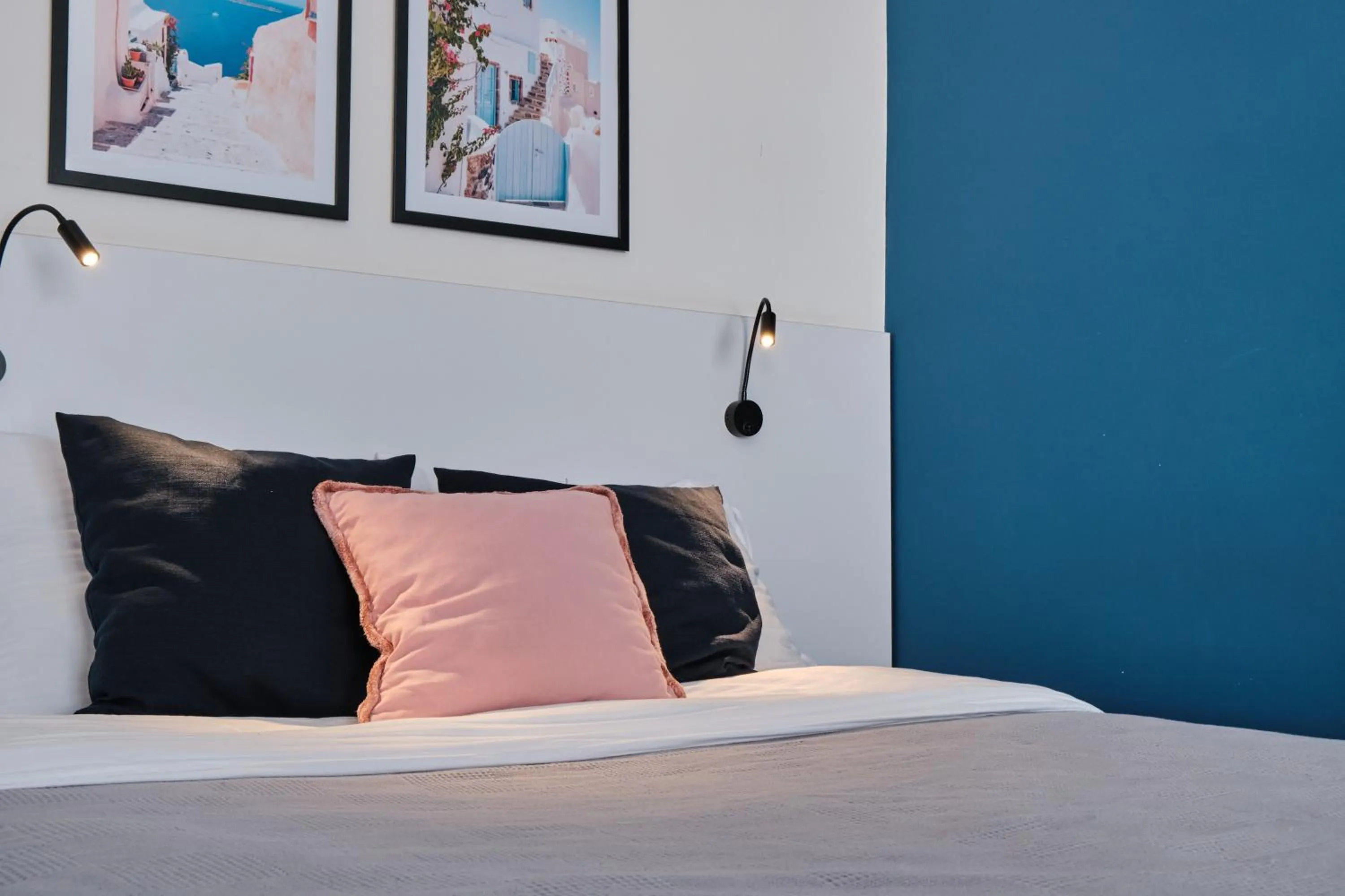 Bed in Seven City Apartments