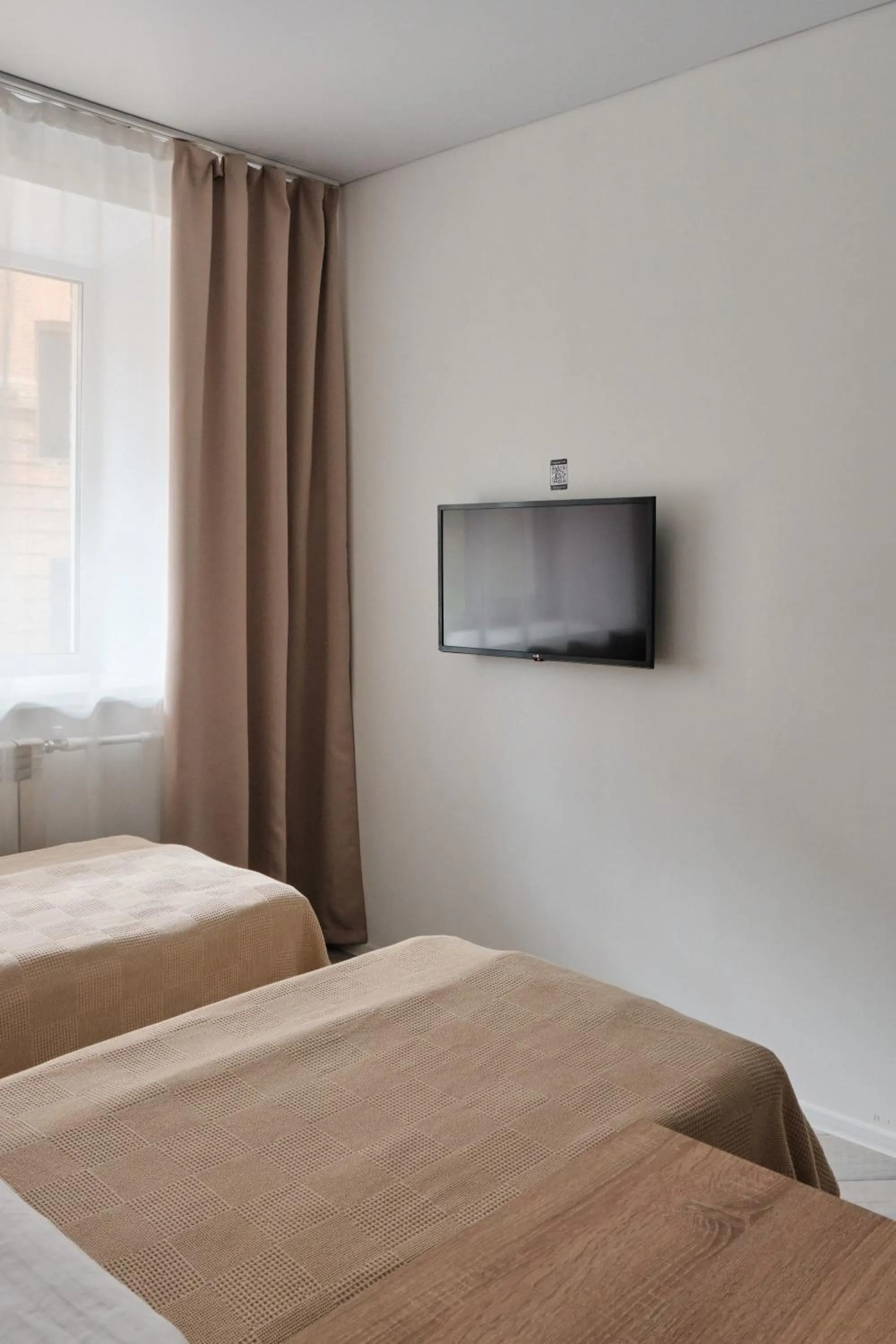 Bed in Seven City Apartments