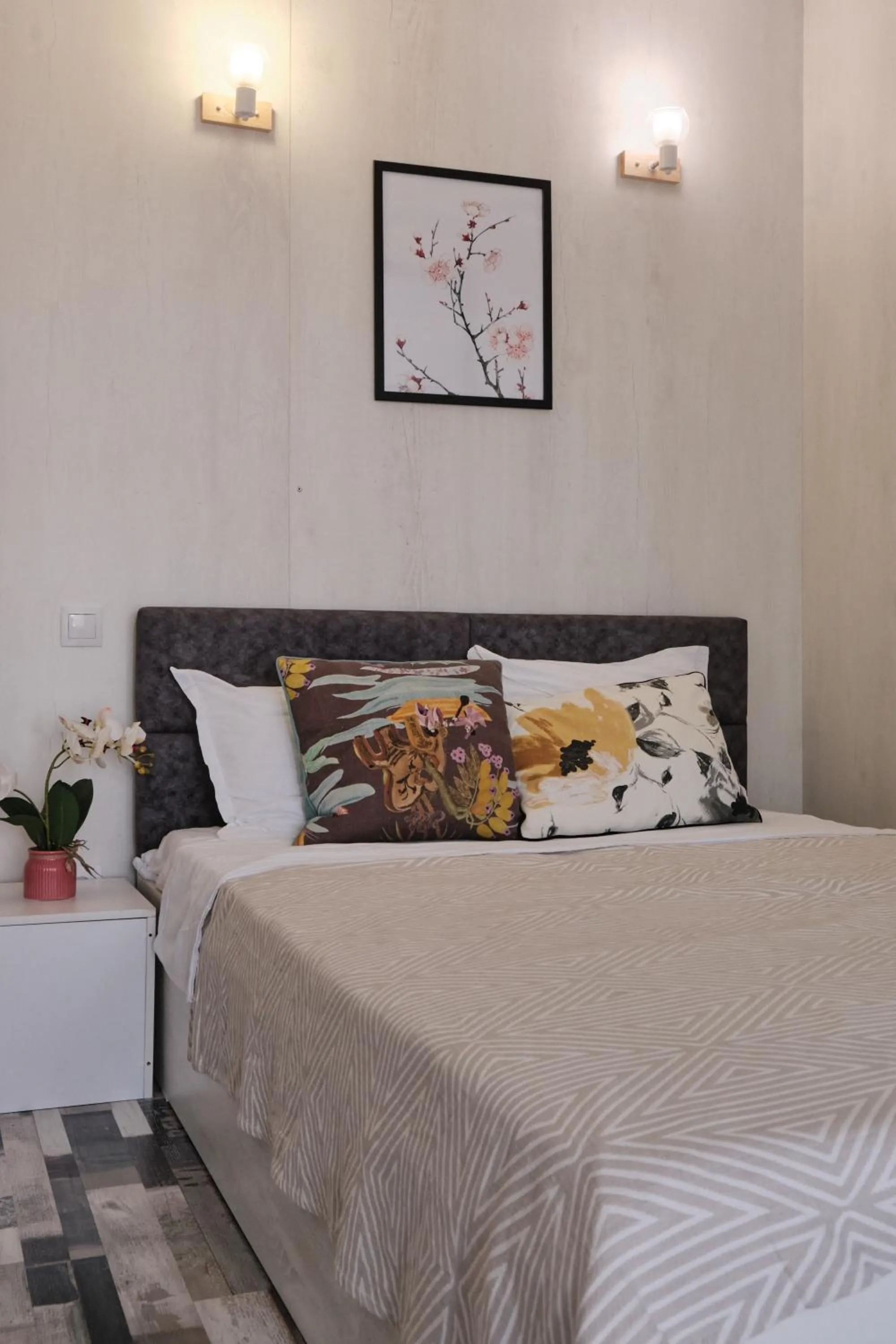 Bed in Seven City Apartments