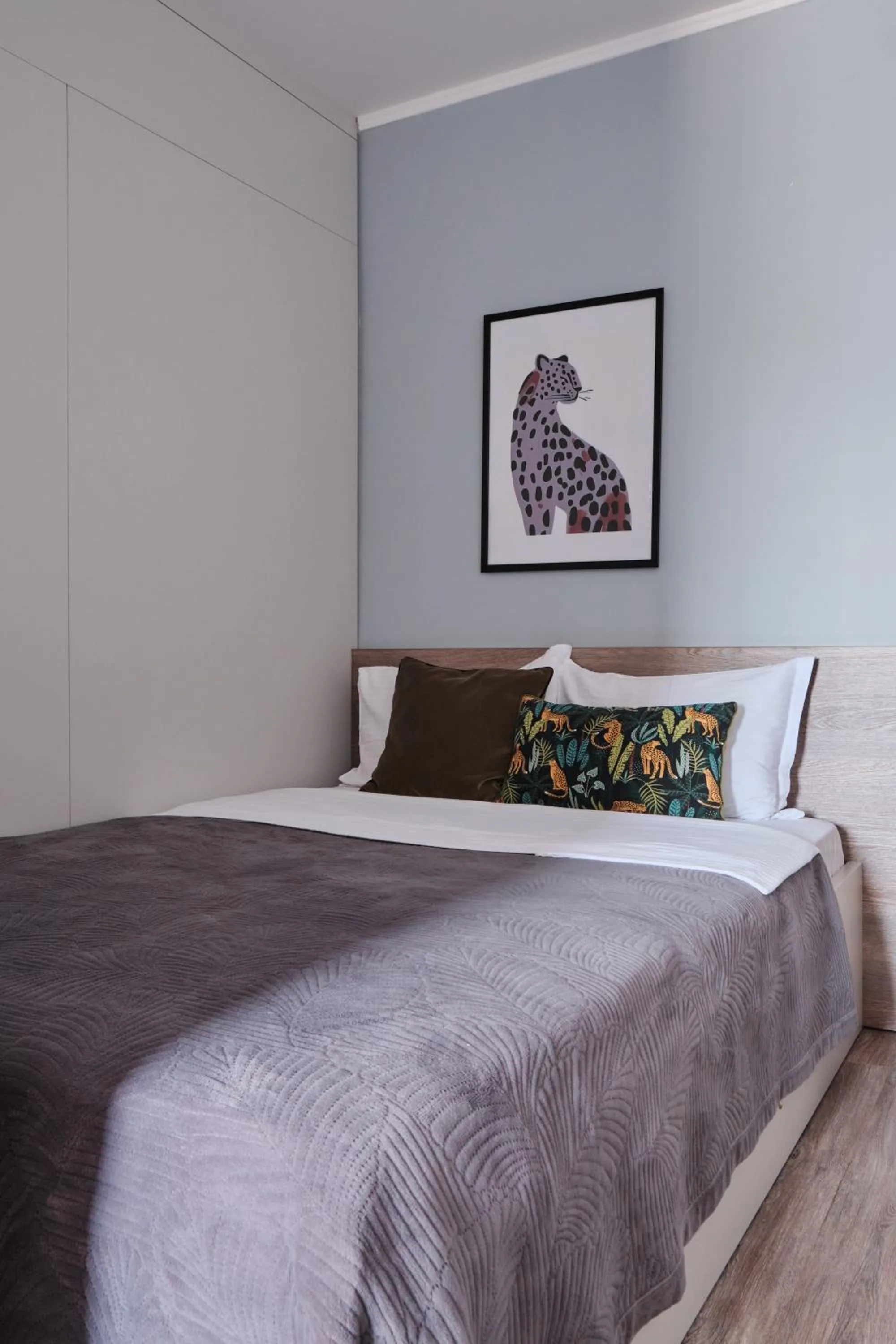 Bed in Seven City Apartments