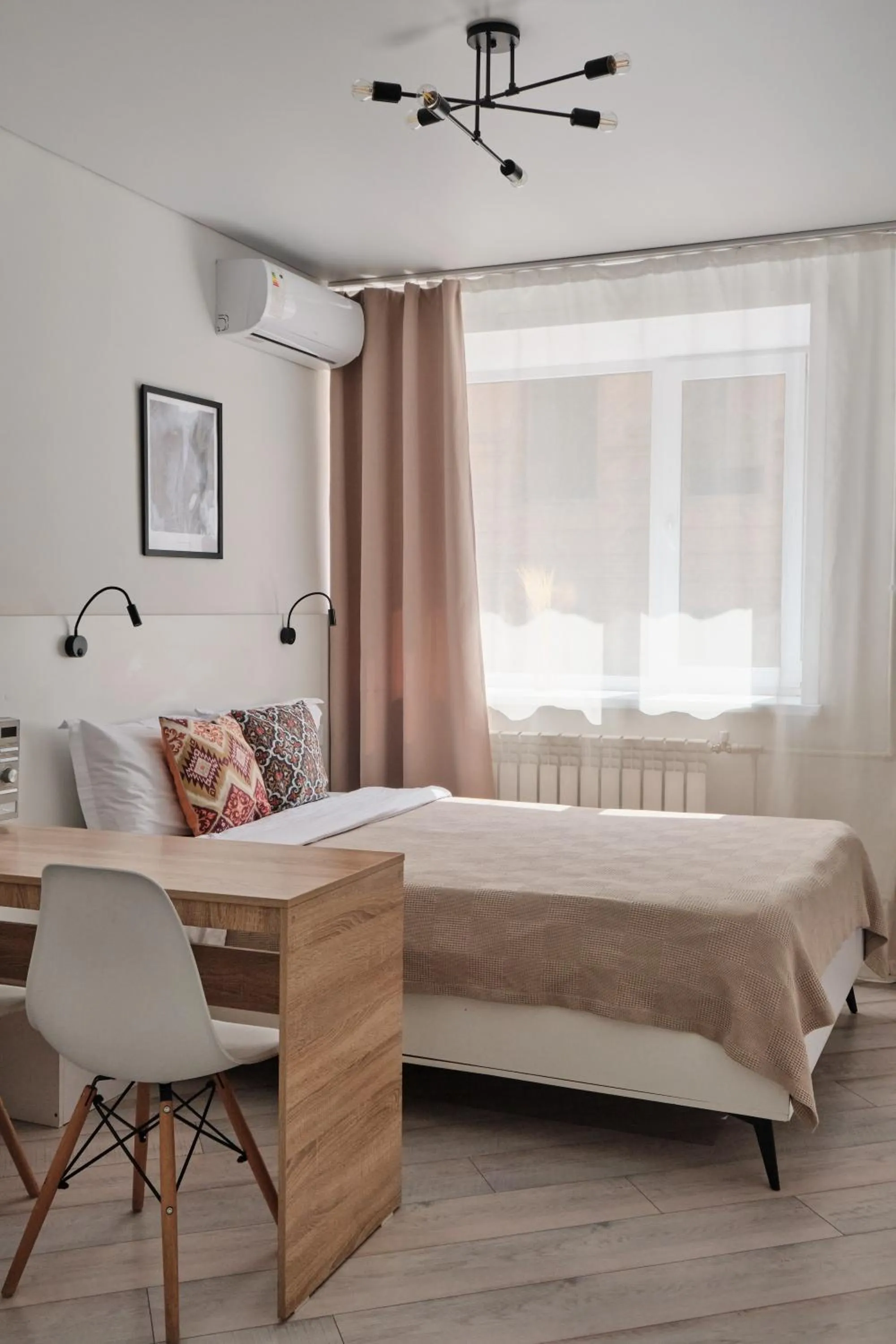 Bed in Seven City Apartments