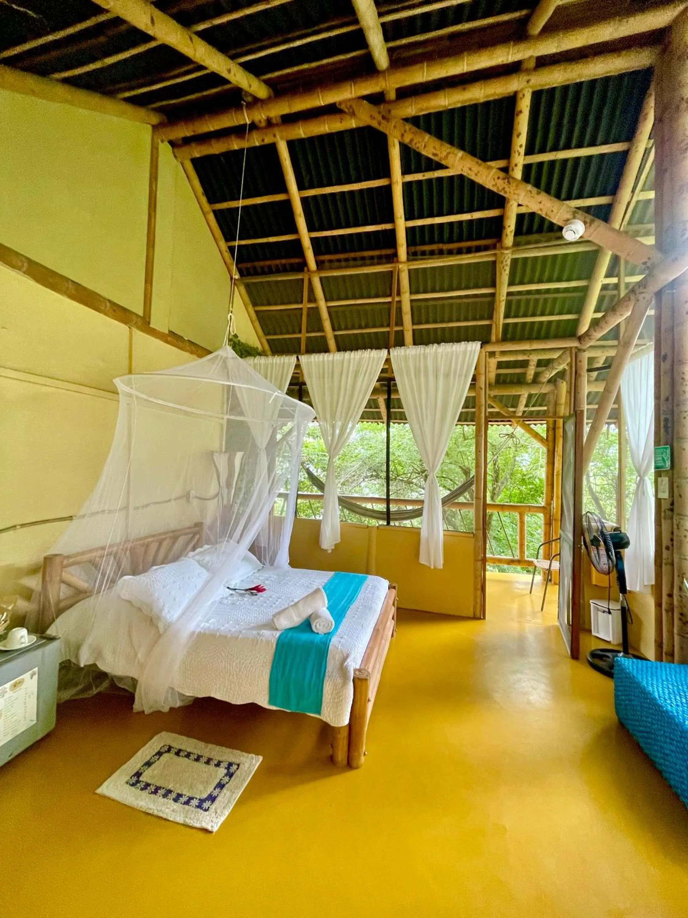 Property building, Bed in Minca Ecohabs Hotel