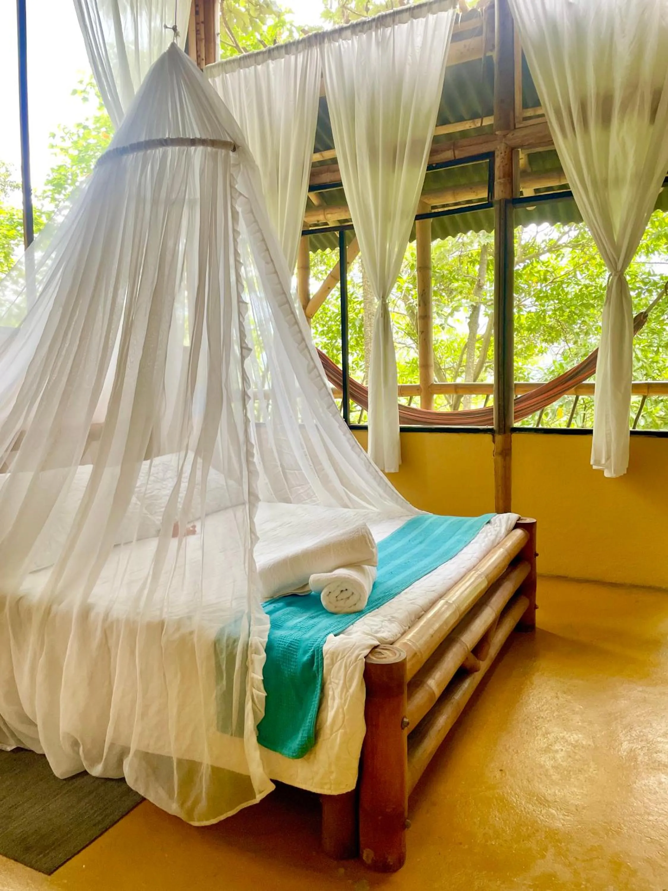 Property building, Bed in Minca Ecohabs Hotel