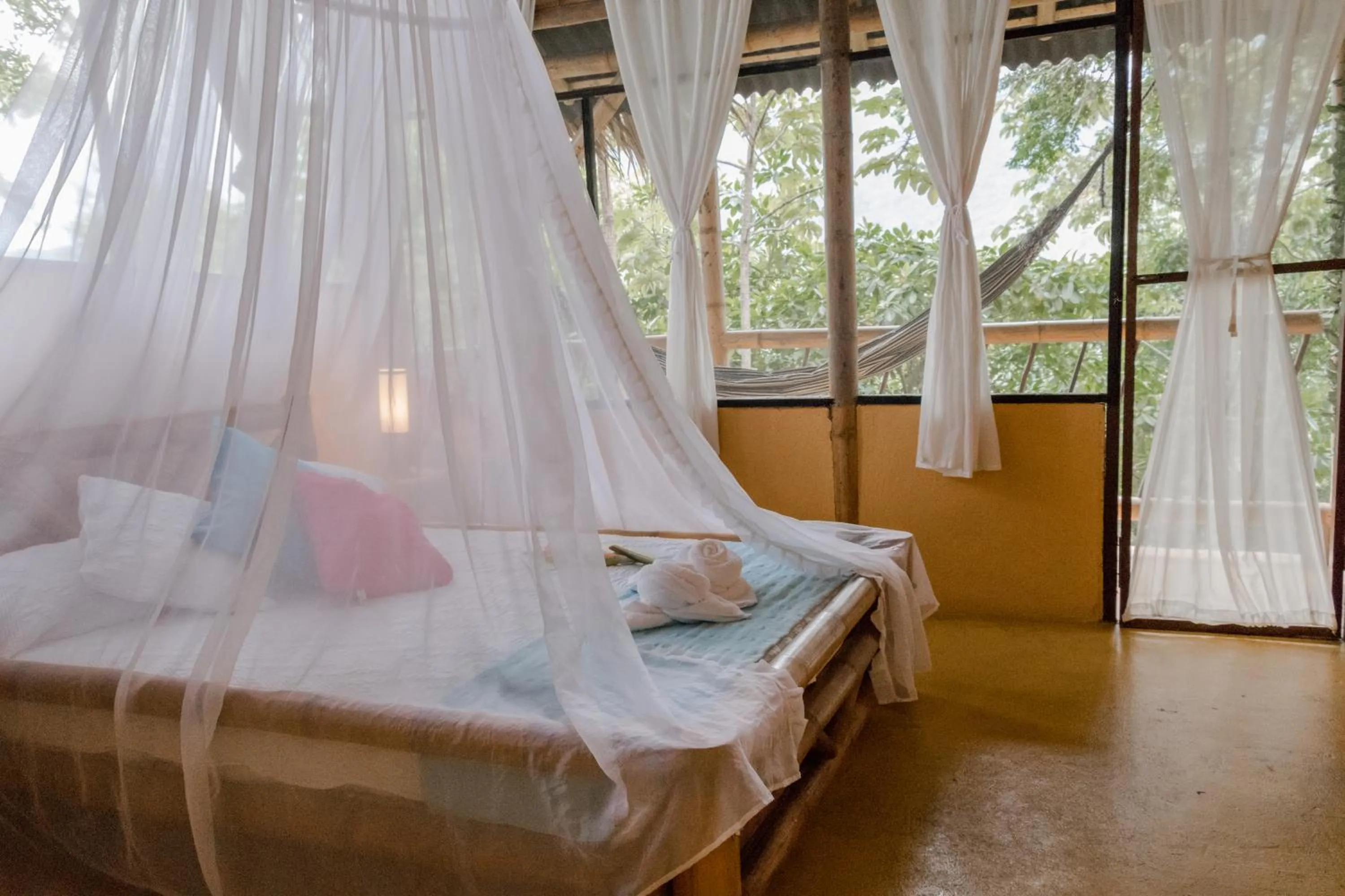 Bed in Minca Ecohabs Hotel