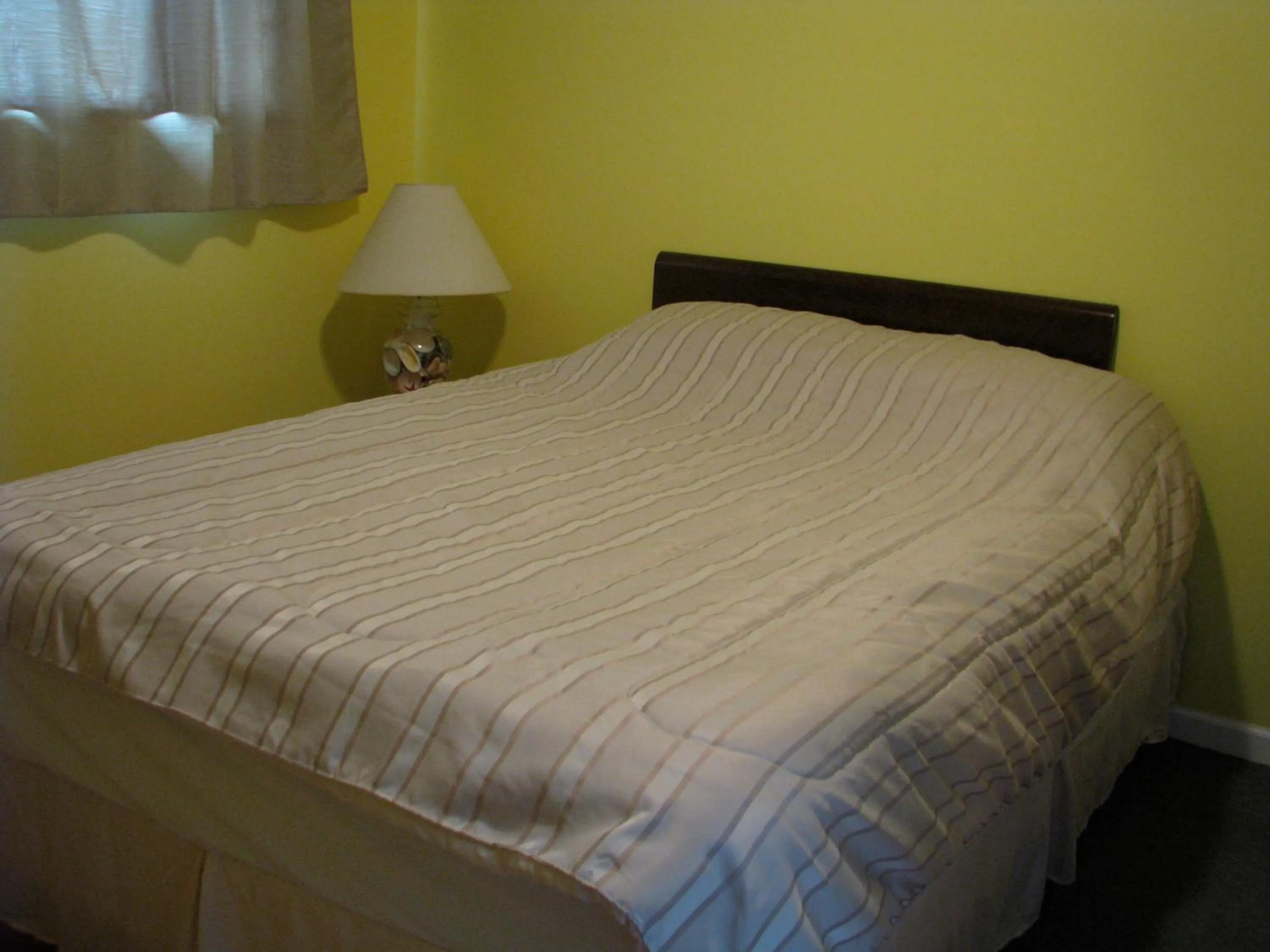 Bed in Fireflies Bed & Breakfast