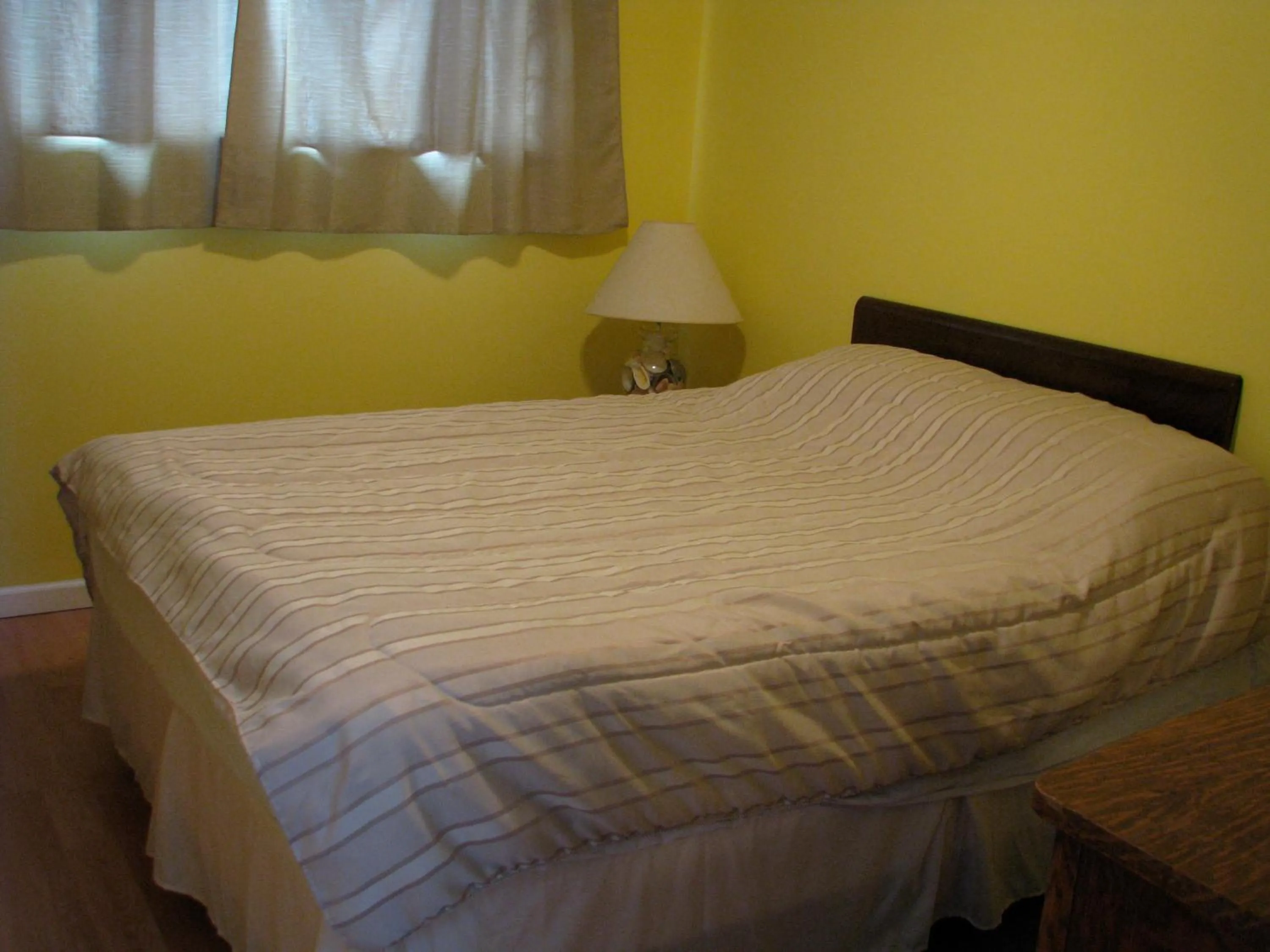 Bed in Fireflies Bed & Breakfast