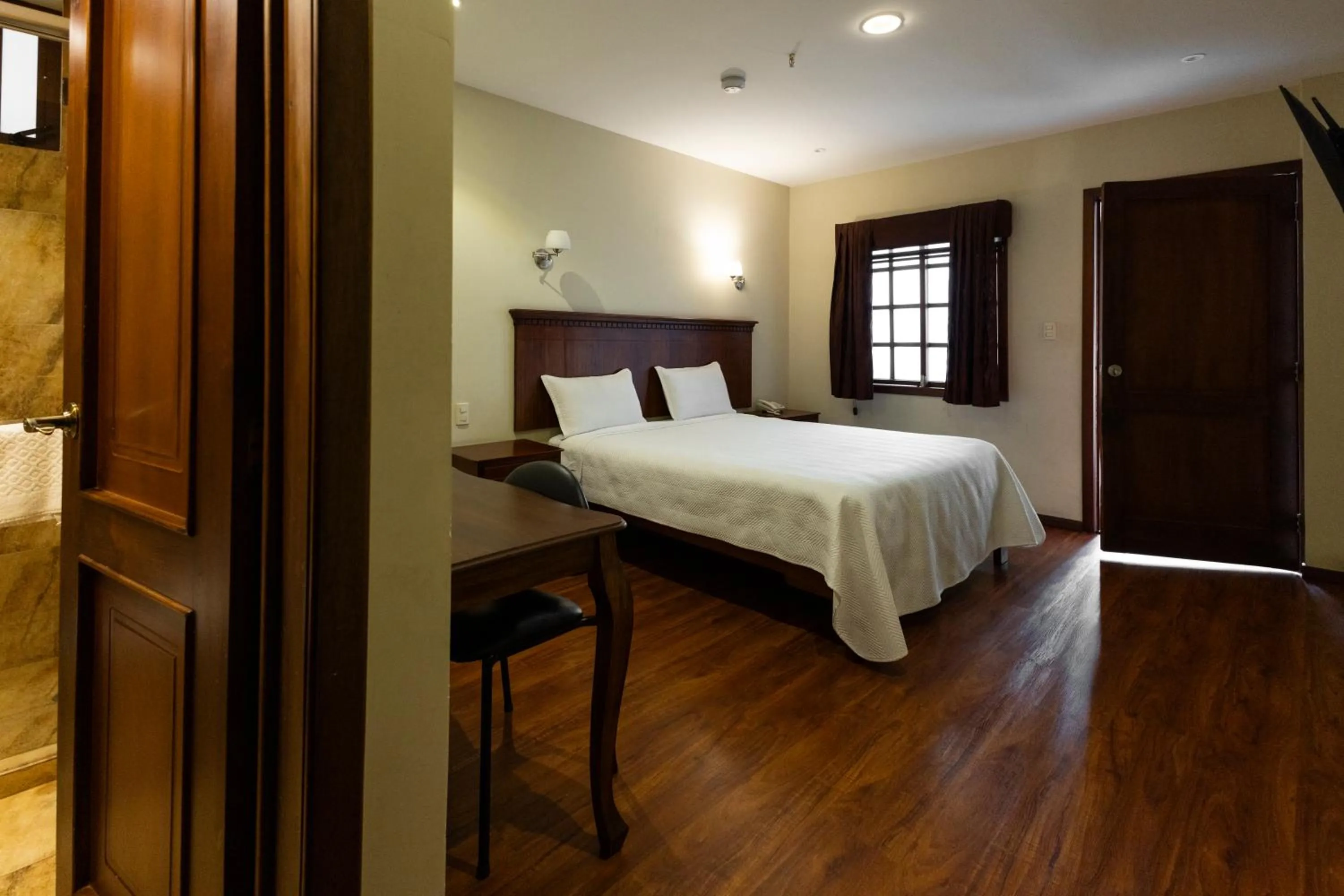 Bed in Hotel & Suites El Quijote