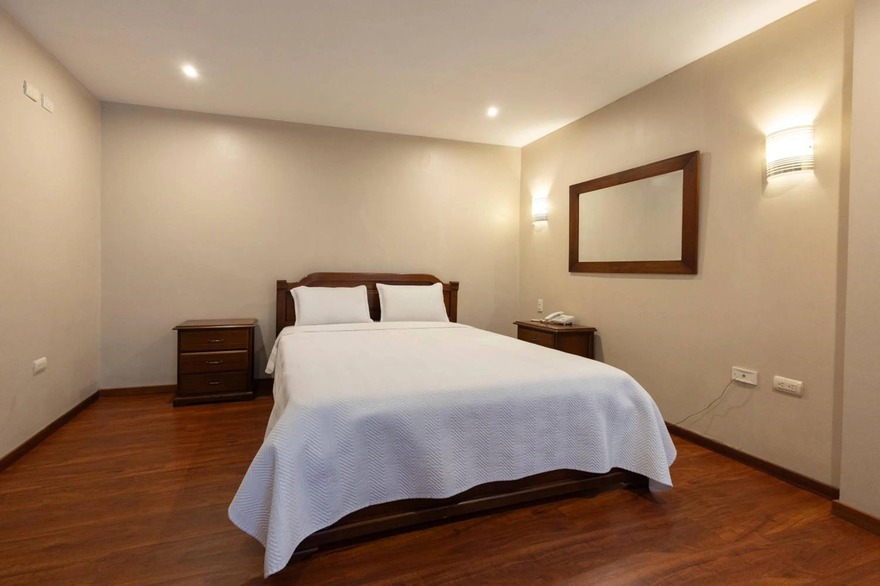 Bed in Hotel & Suites El Quijote