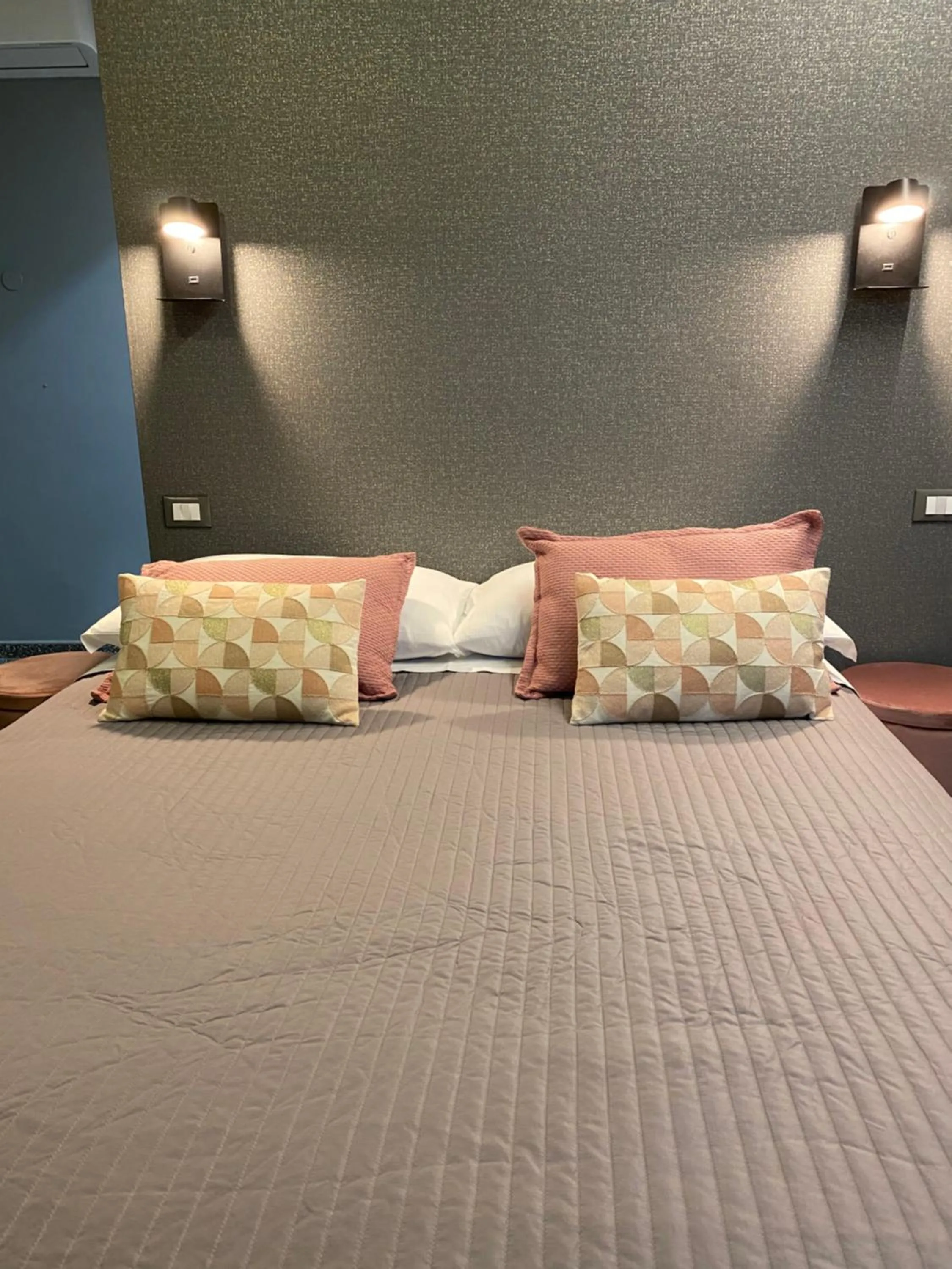 Bed in La Taverna Antica Rooms