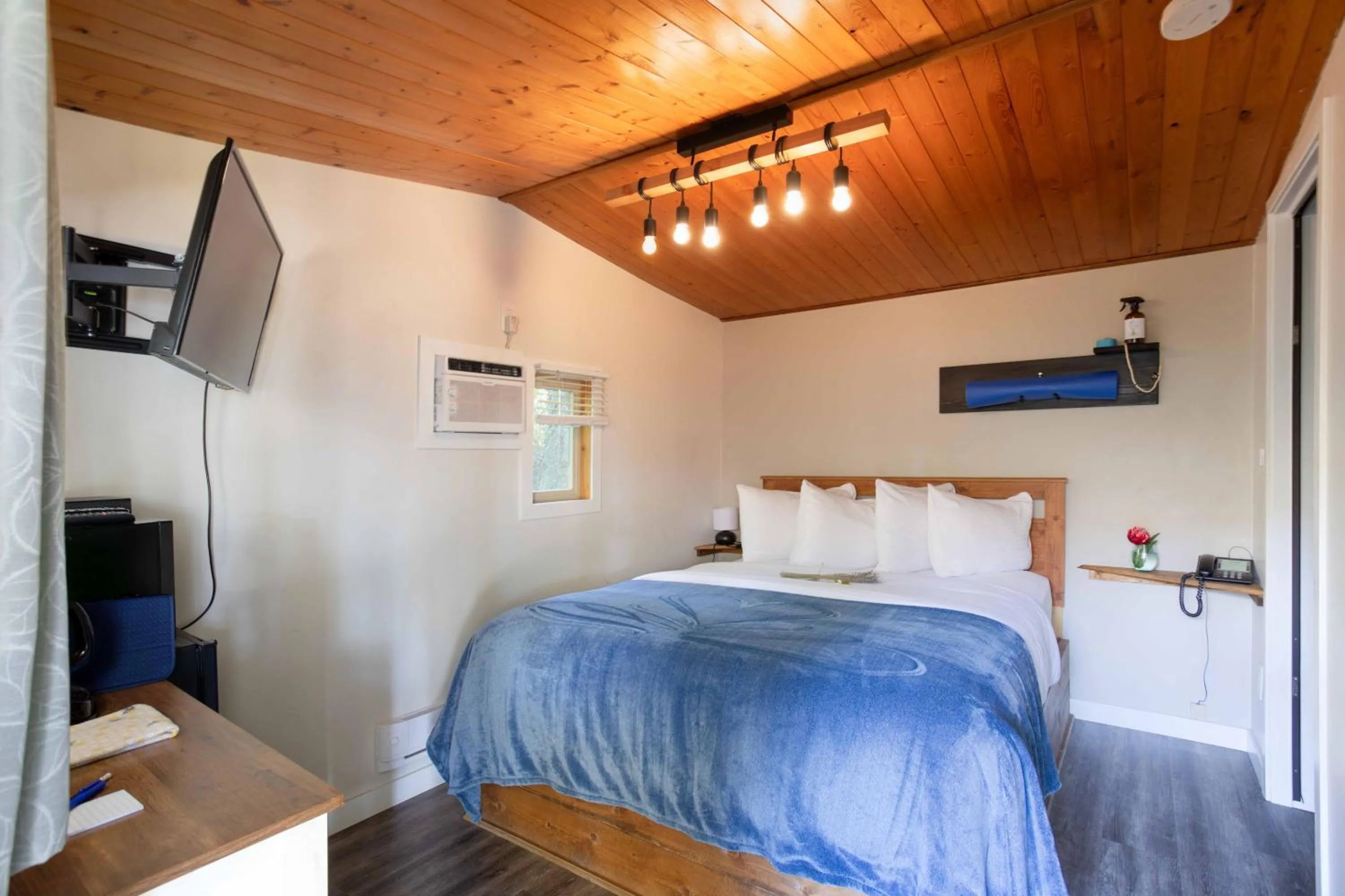 Bed in The Valley View Cabins and Event Center