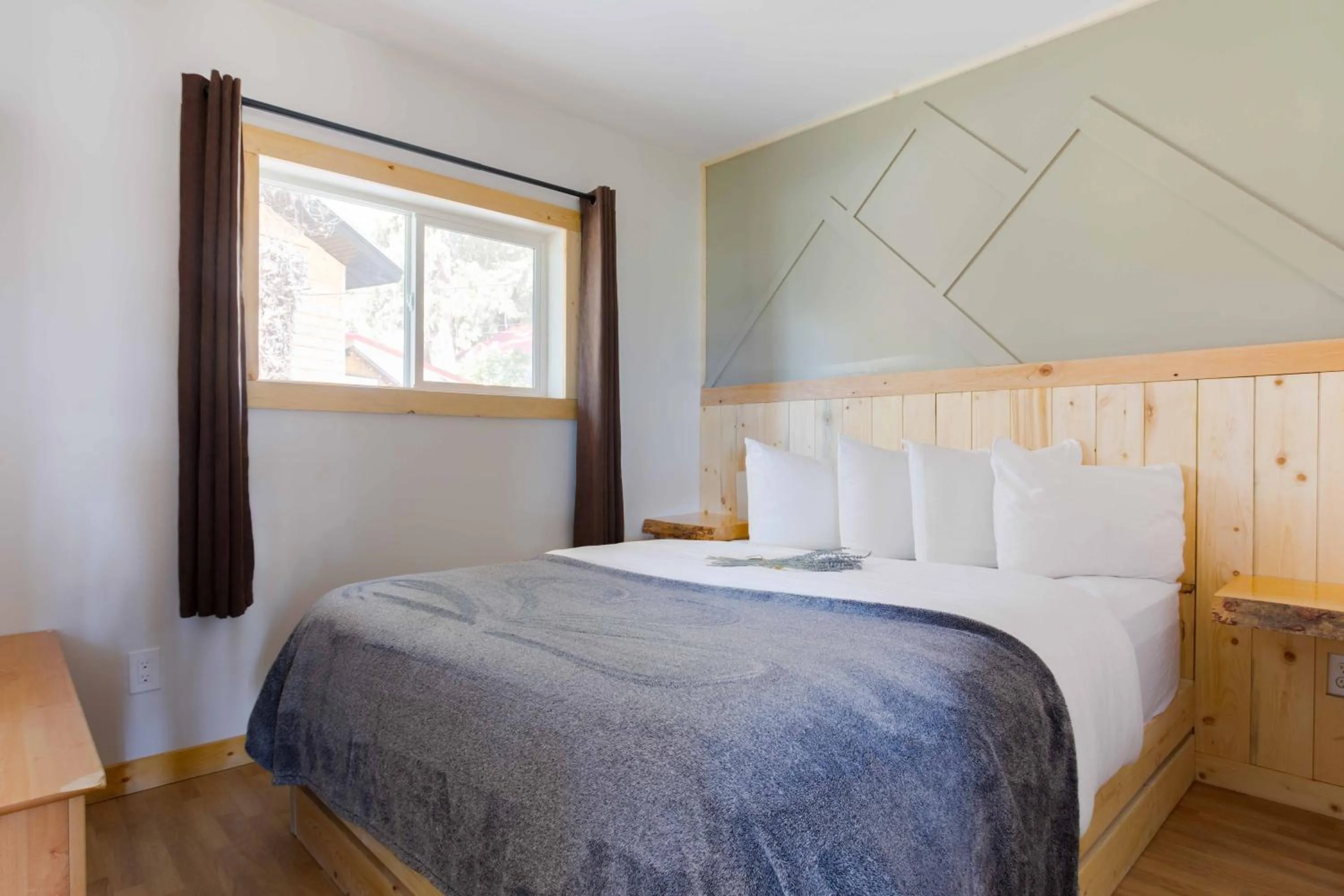 Bed in The Valley View Cabins and Event Center