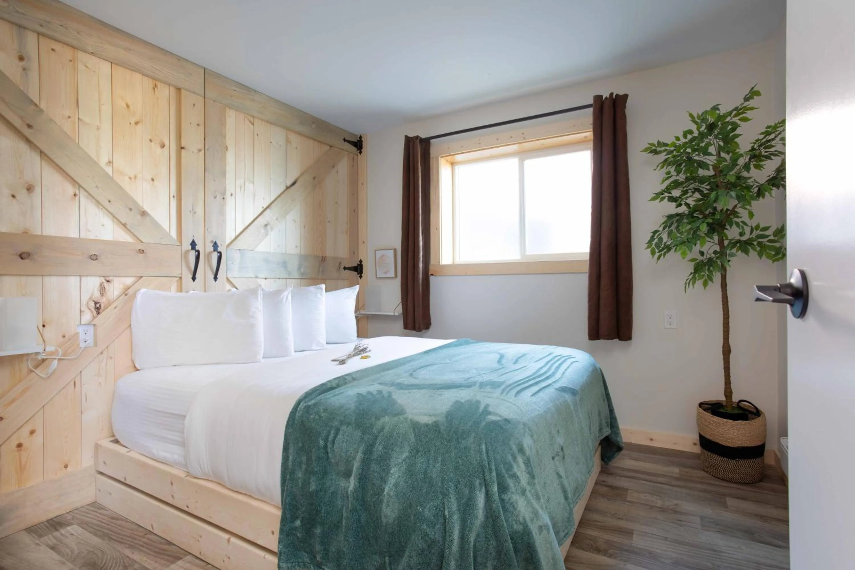 Bed in The Valley View Cabins and Event Center