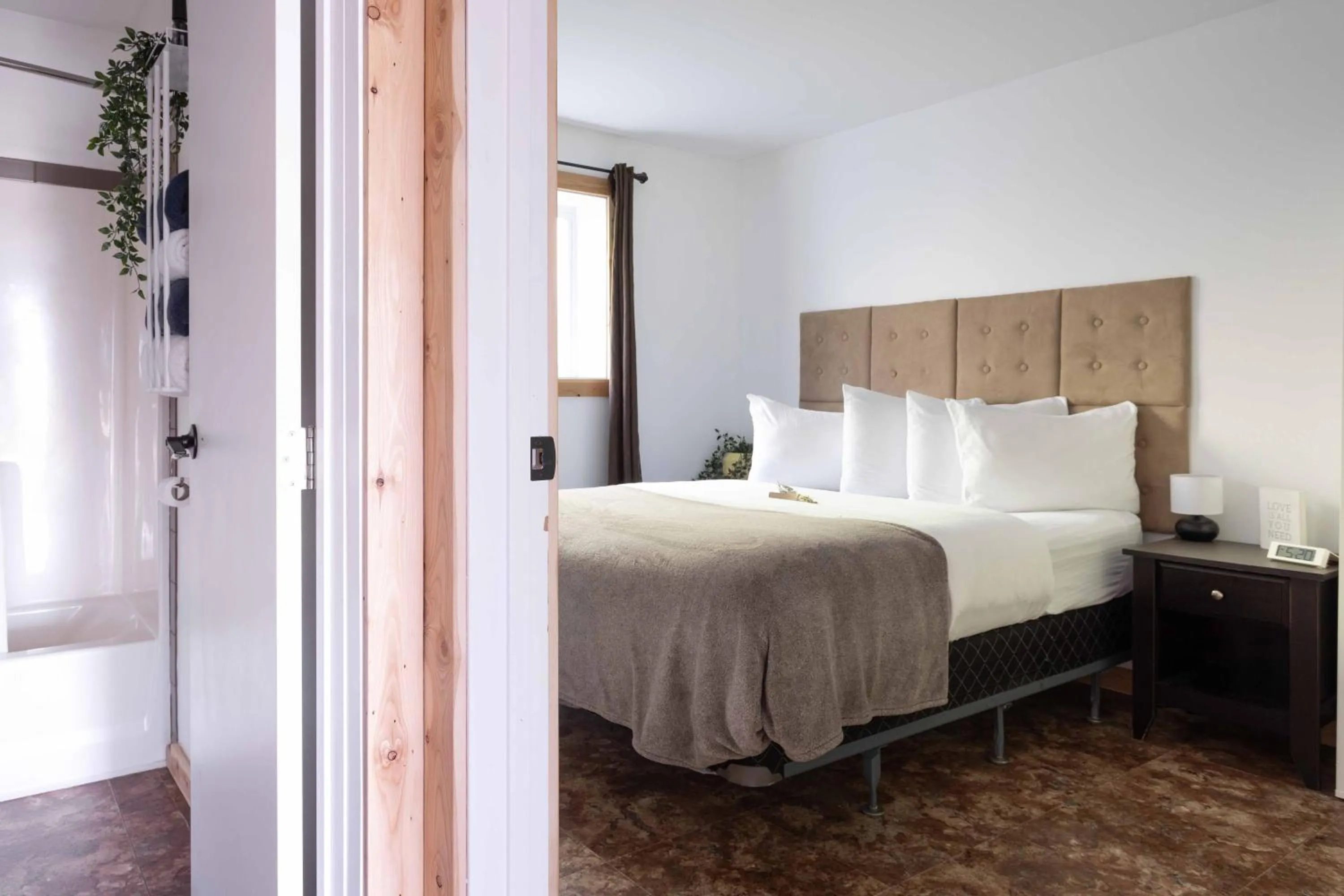 Bed in The Valley View Cabins and Event Center