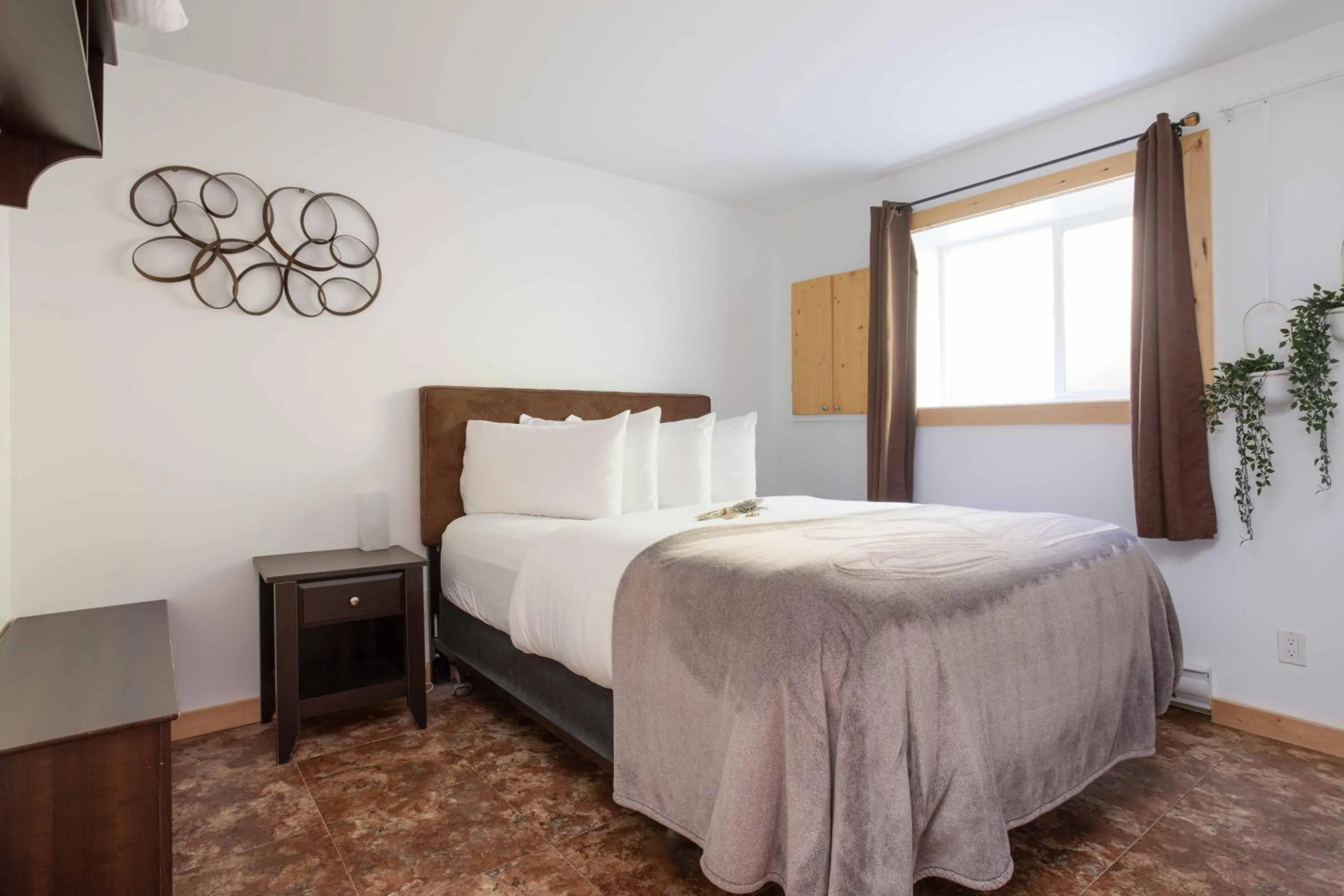 Bed in The Valley View Cabins and Event Center