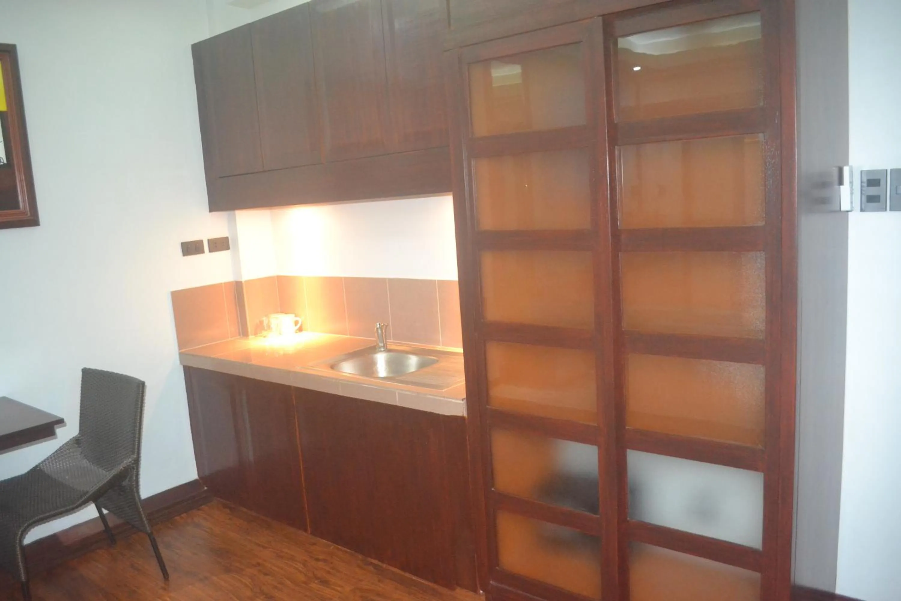 Kitchen or kitchenette in DM Residente Hotel Inns & Villas