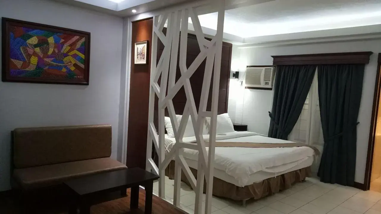 Bedroom, Bed in DM Residente Hotel Inns & Villas Bedroom, Bed in DM Residente Hotel Inns & Villas