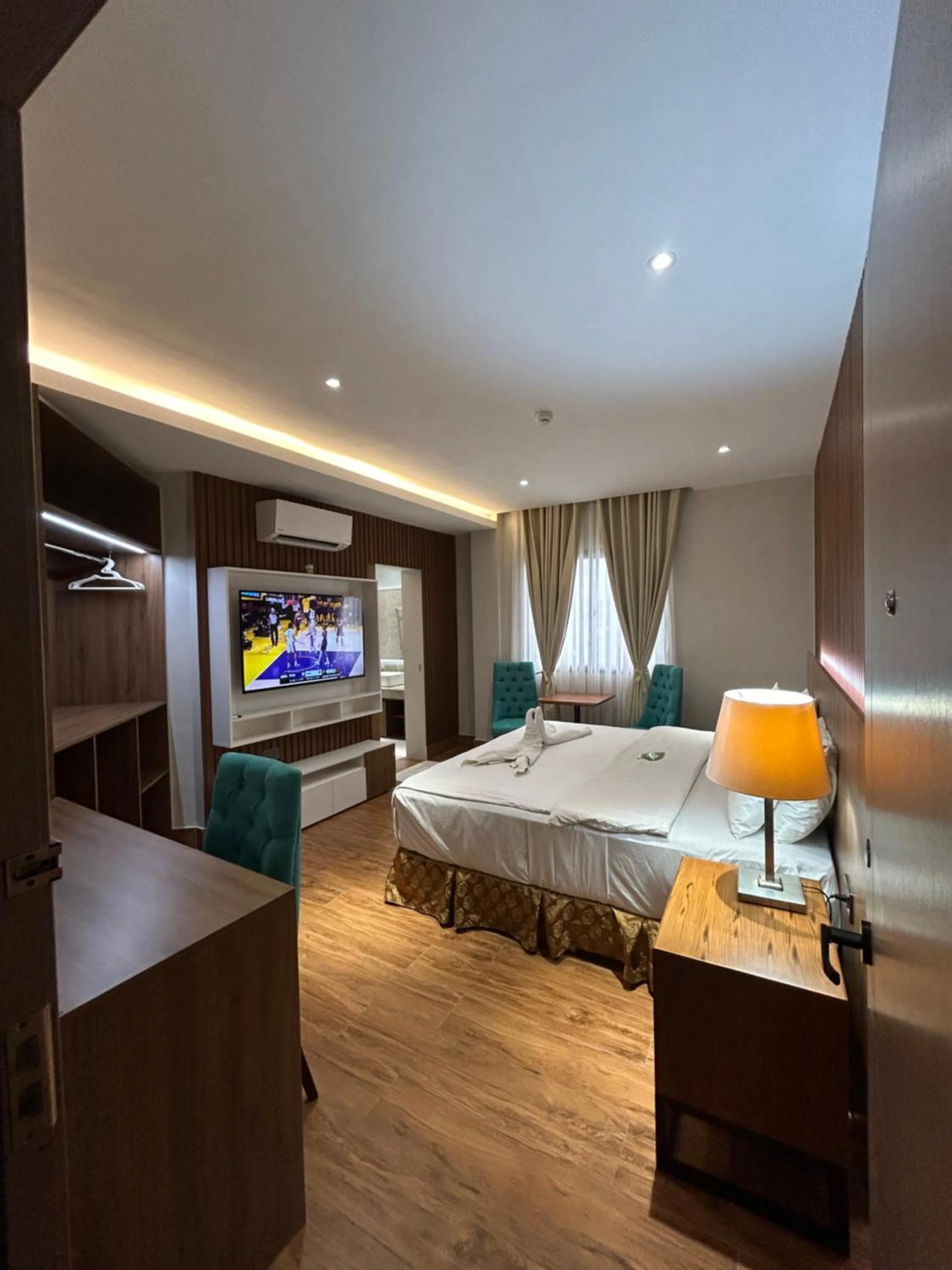 Bed in DM Residente Hotel Inns & Villas