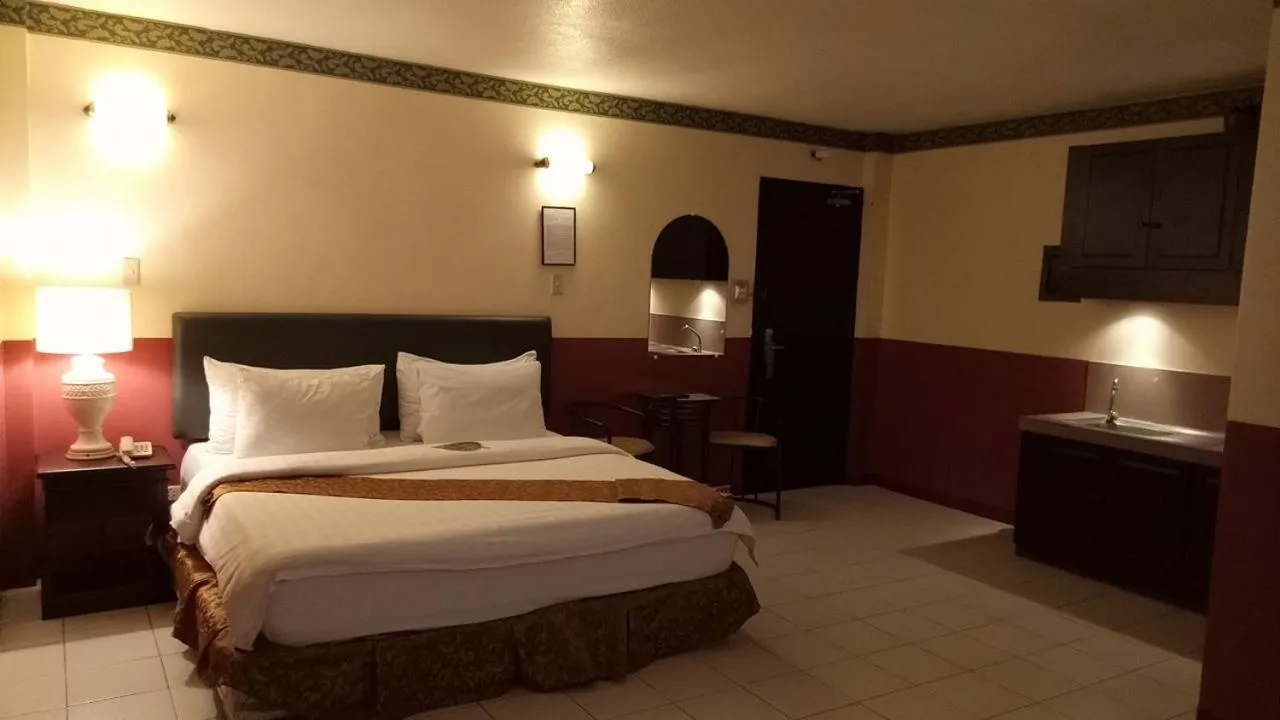 Bedroom, Bed in DM Residente Hotel Inns & Villas