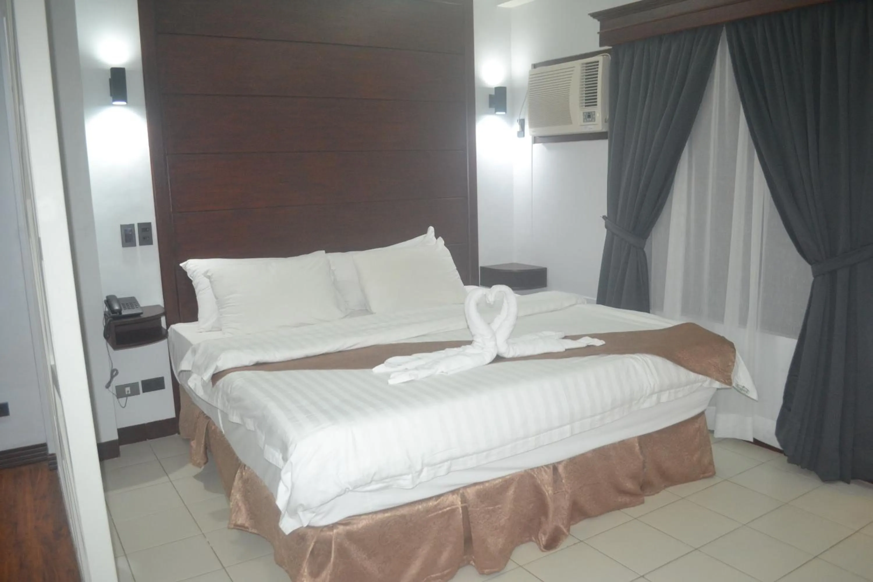 Photo of the whole room, Bed in DM Residente Hotel Inns & Villas
